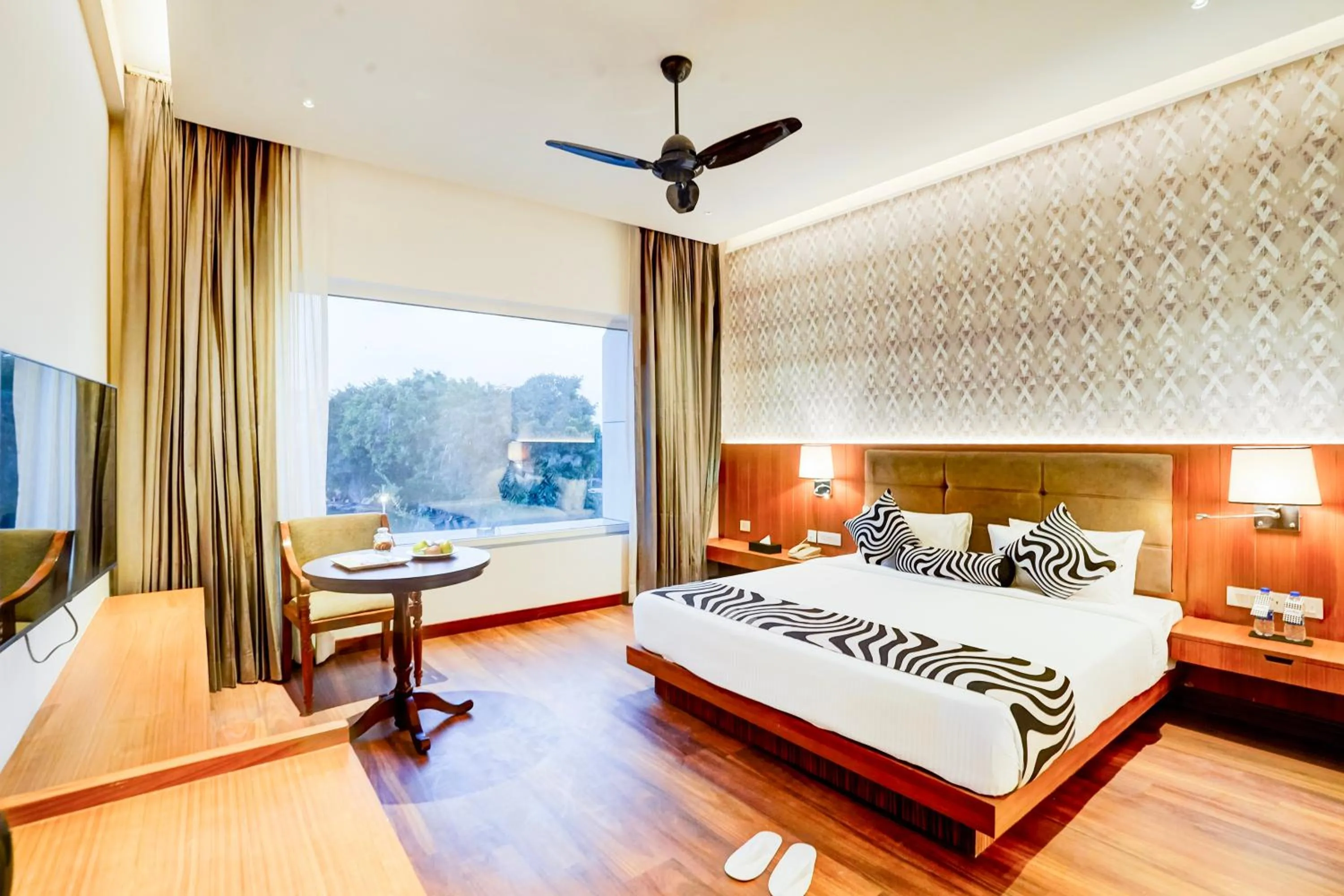 Photo of the whole room, Bed in Sunday Resort & Spa by CheckIn Manesar Gurugram