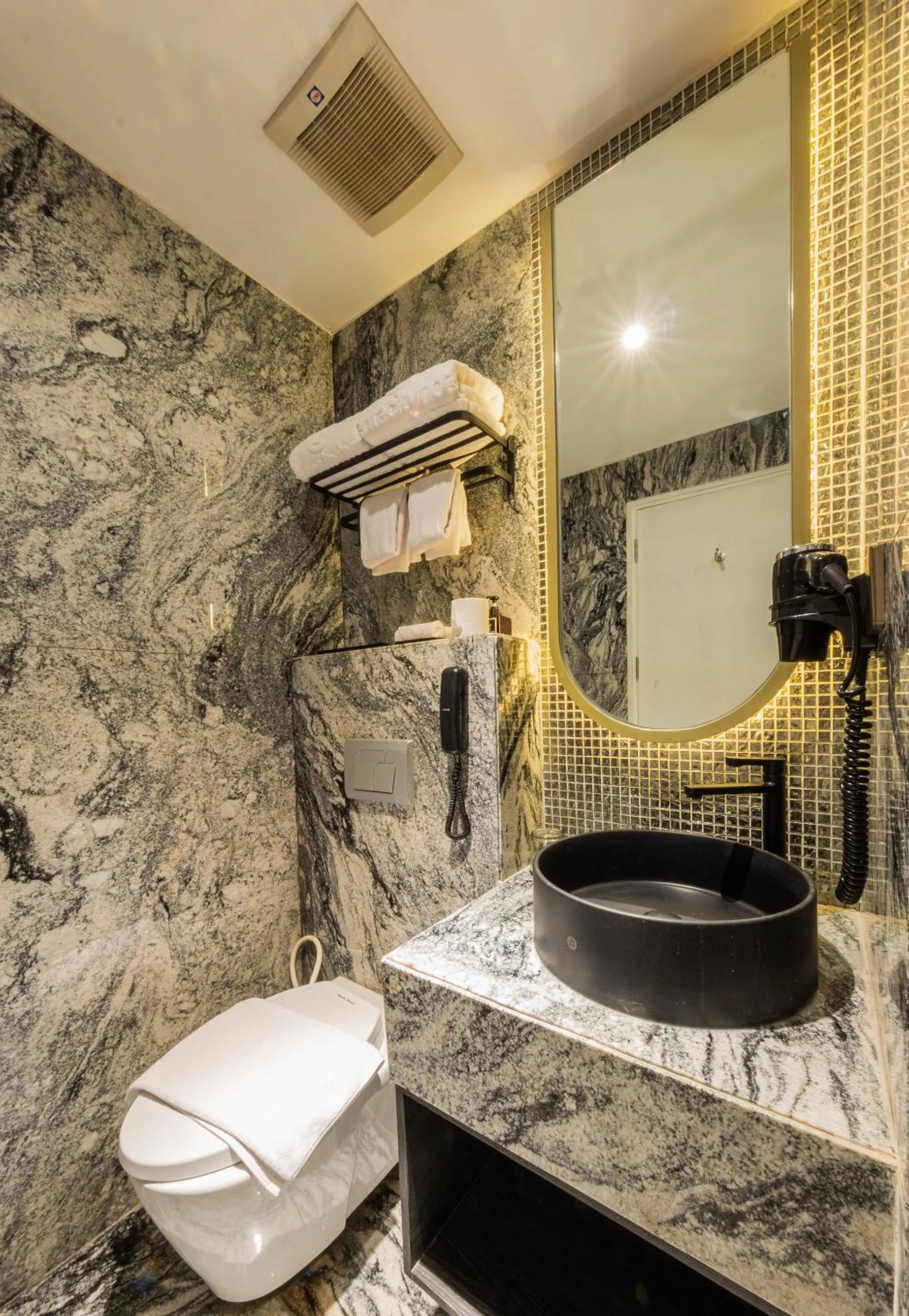 Bathroom in The All - Suite Pentacity Hotel Balikpapan