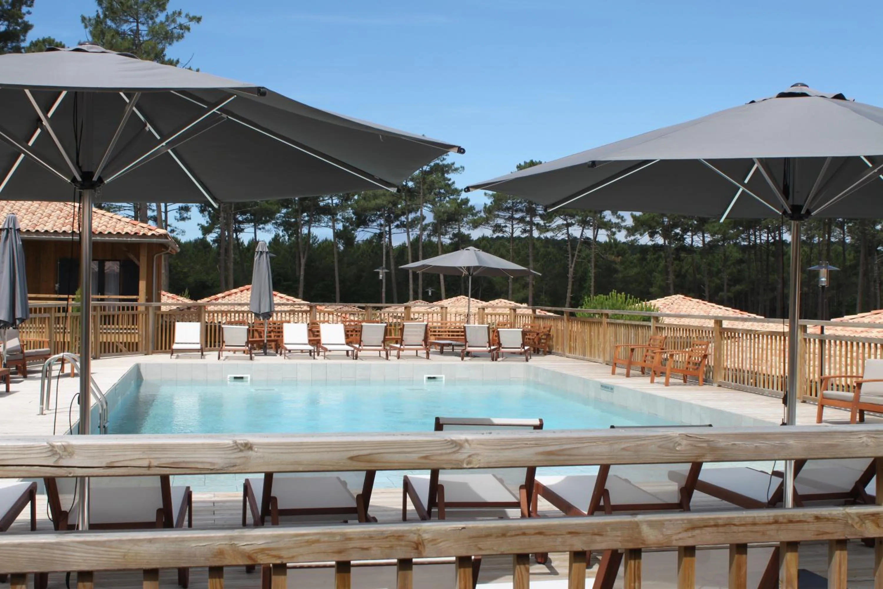 Swimming pool in Domaine du Ferret Restaurant & Spa