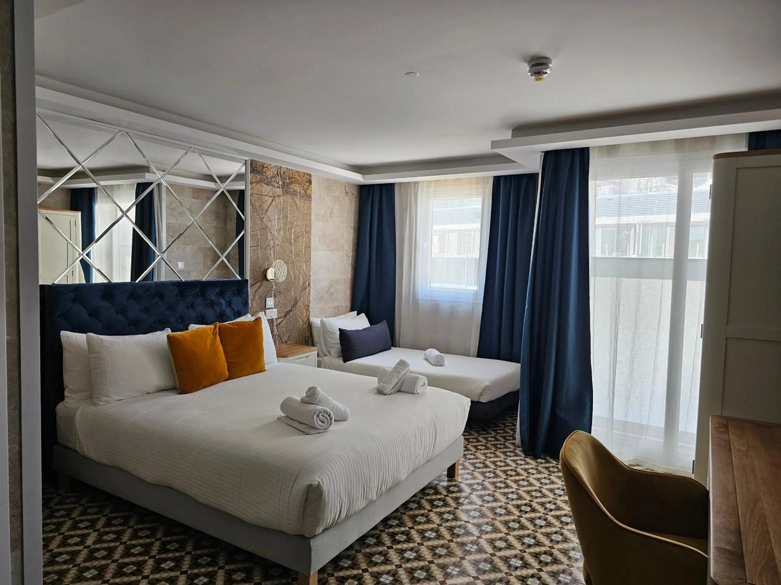 Bed in Balcony Hotel