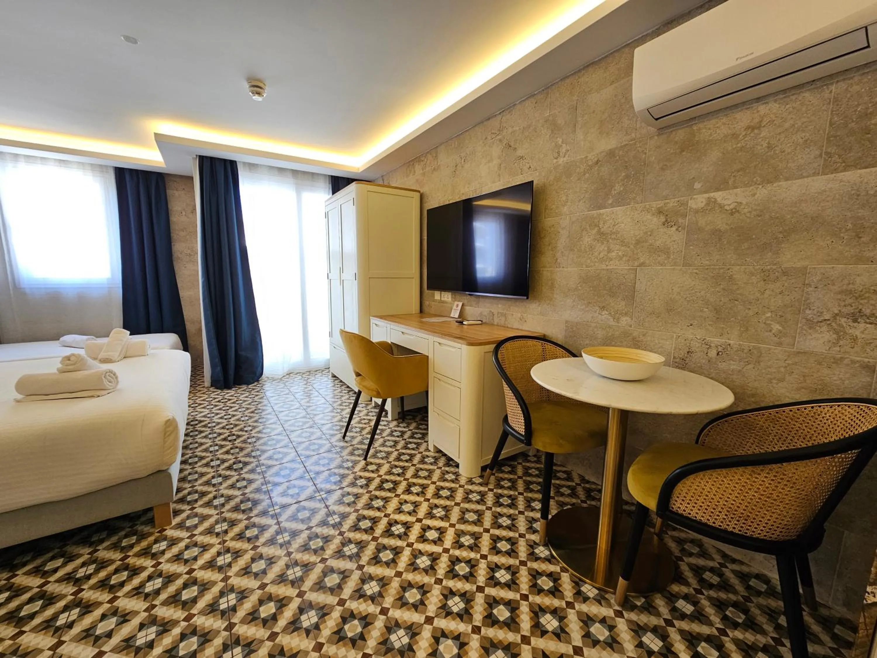 Bed in Balcony Hotel