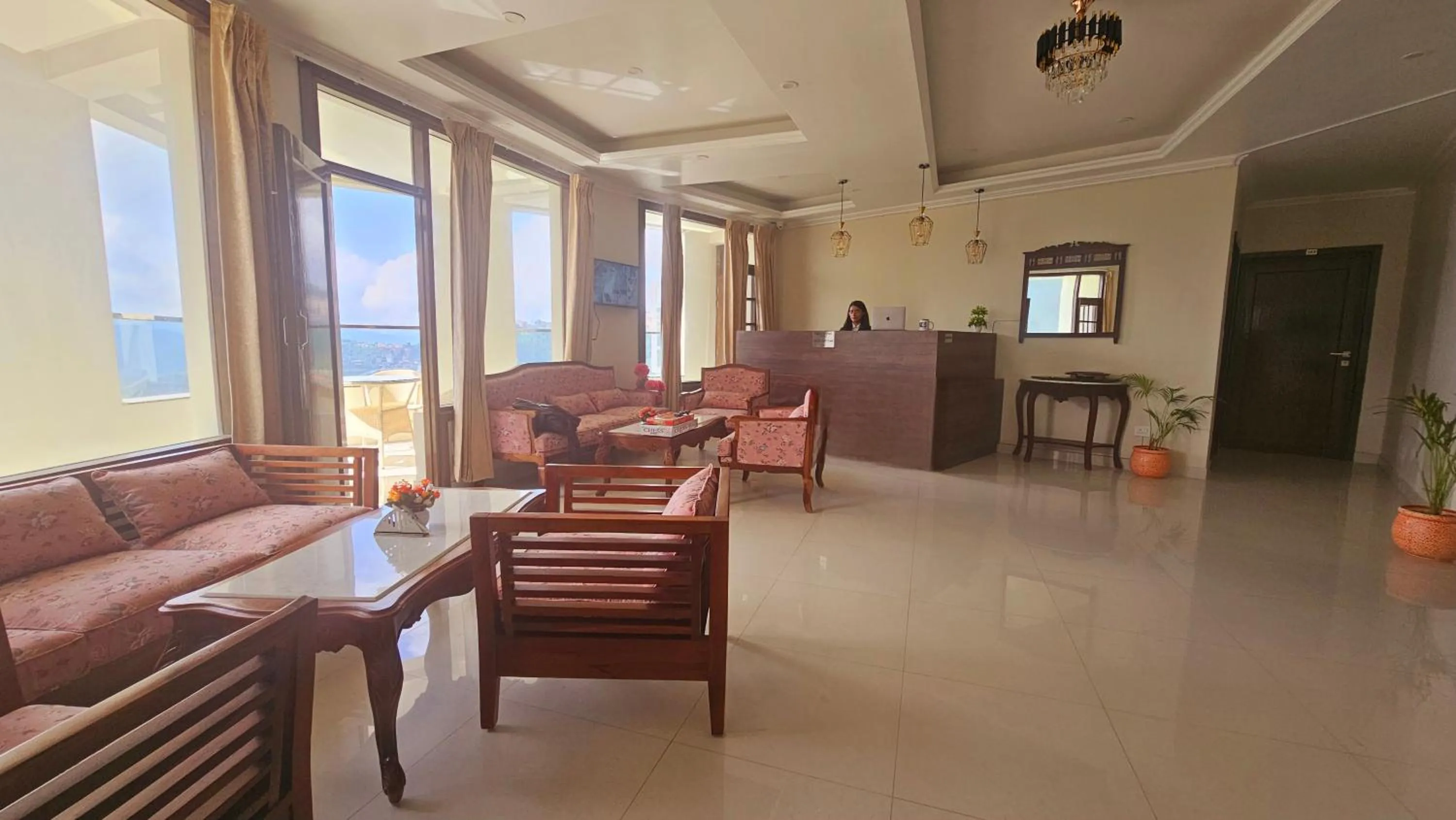 Lobby or reception in Hydrangea Heights by PTW Hotels