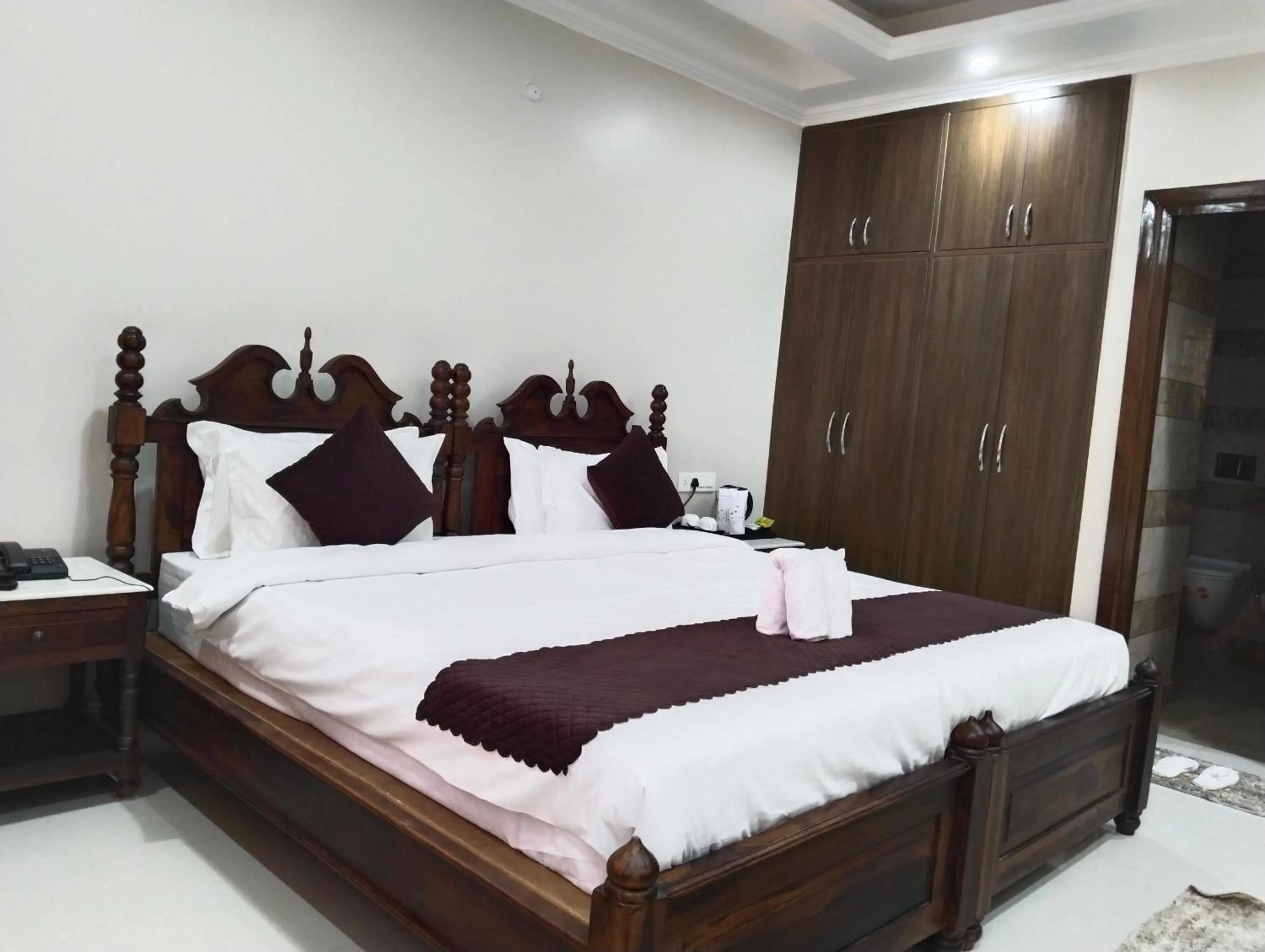 Bed in Hydrangea Heights by PTW Hotels