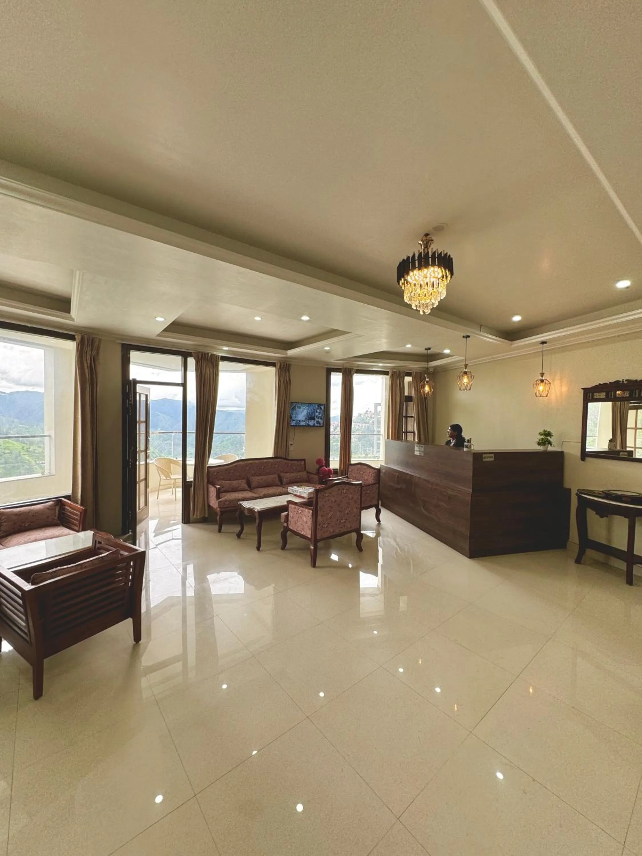 Lobby or reception in Hydrangea Heights by PTW Hotels