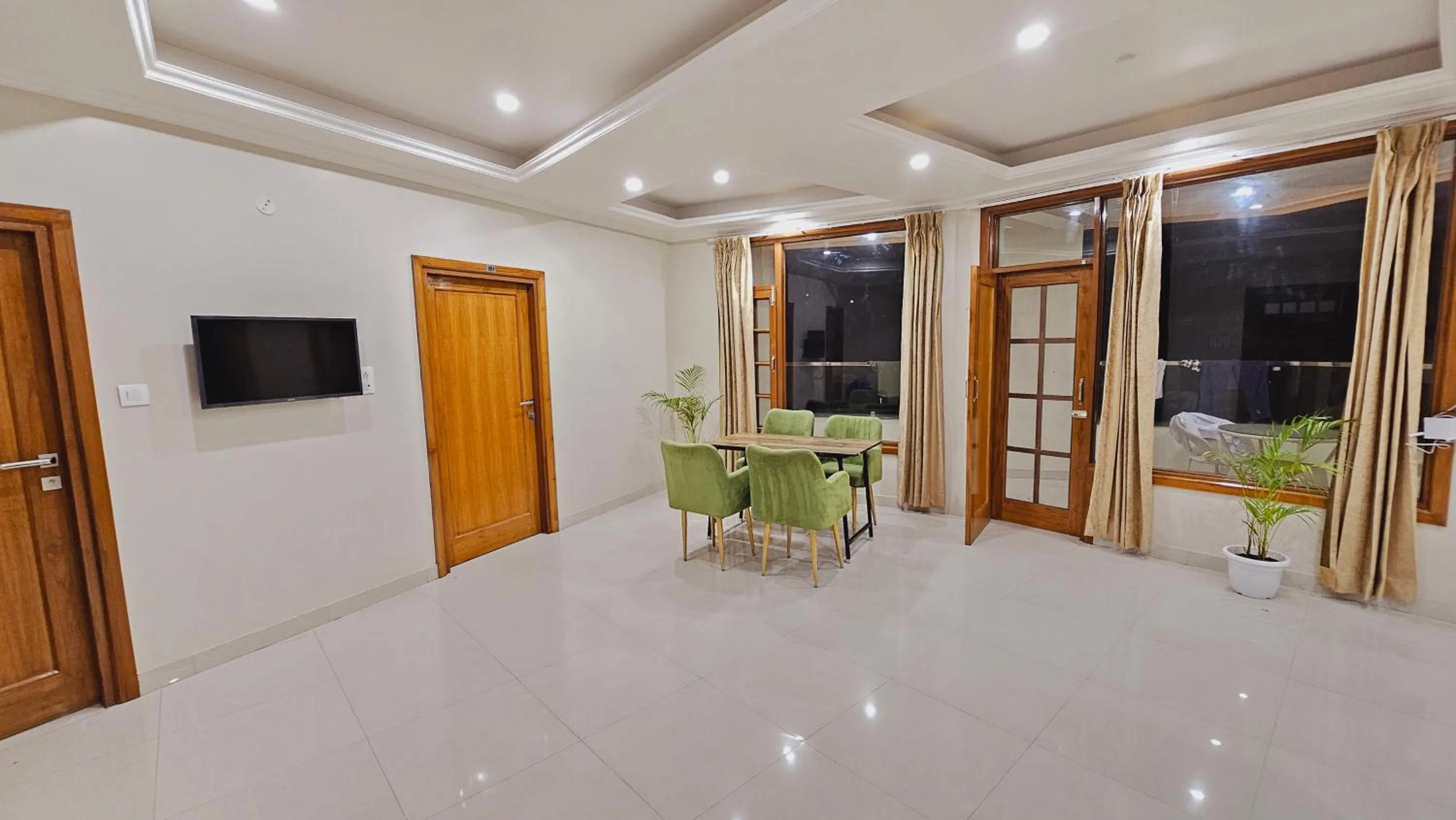 Communal lounge/ TV room in Hydrangea Heights by PTW Hotels