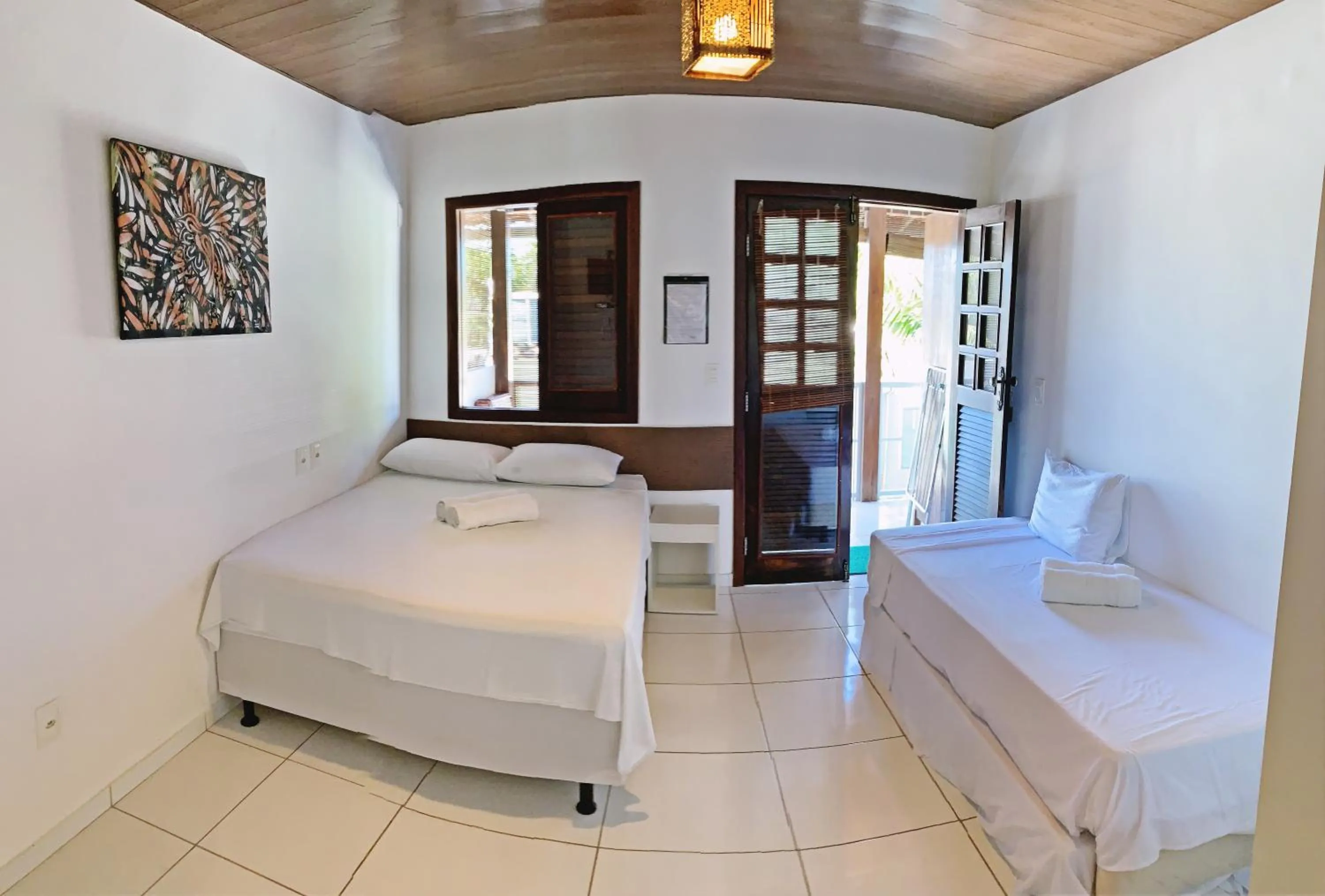 Photo of the whole room, Bed in Pousada Brasil Caribe