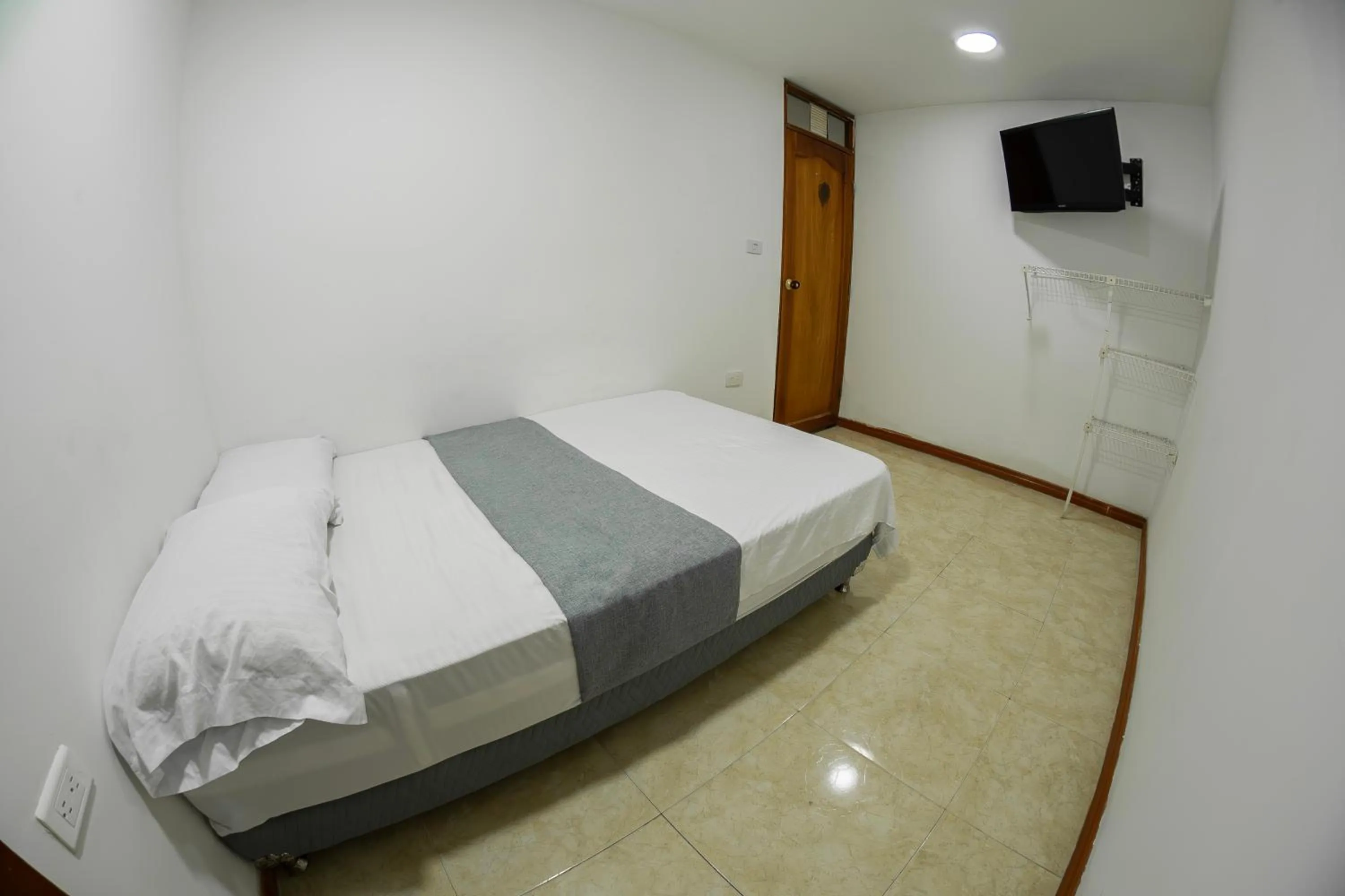 Bed in Hotel Santander Plaza