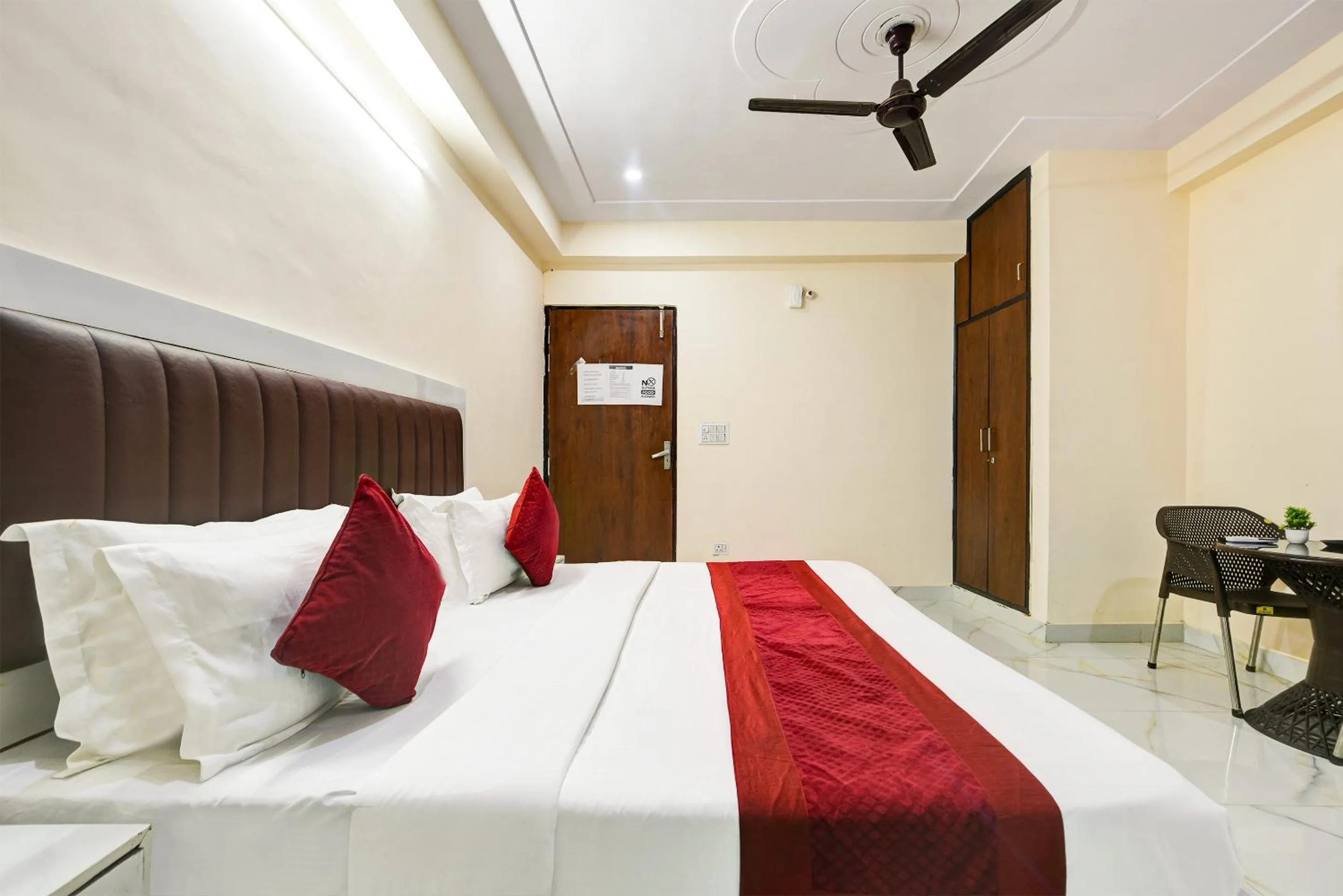 Bed in Hotel Krishna Tower