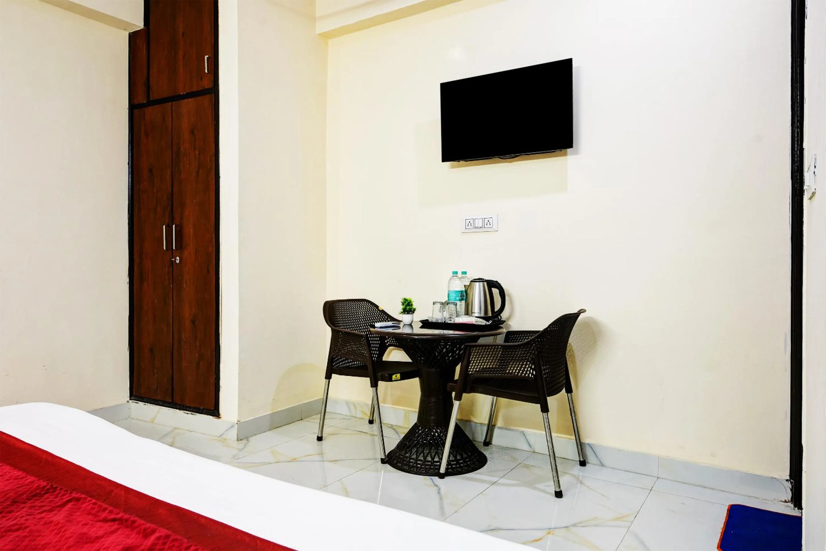 Bed in Hotel Krishna Tower