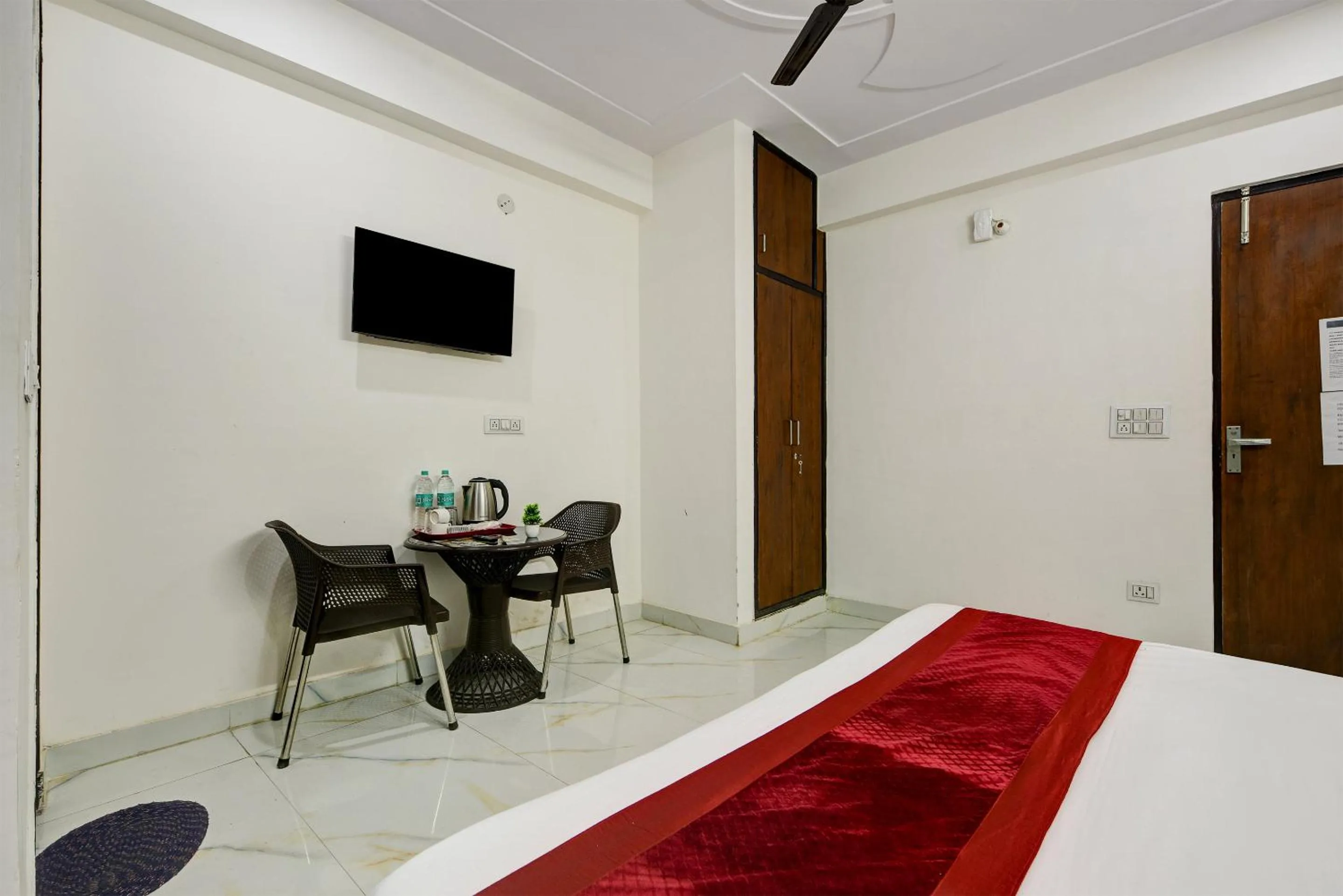 Bed in Hotel Krishna Tower