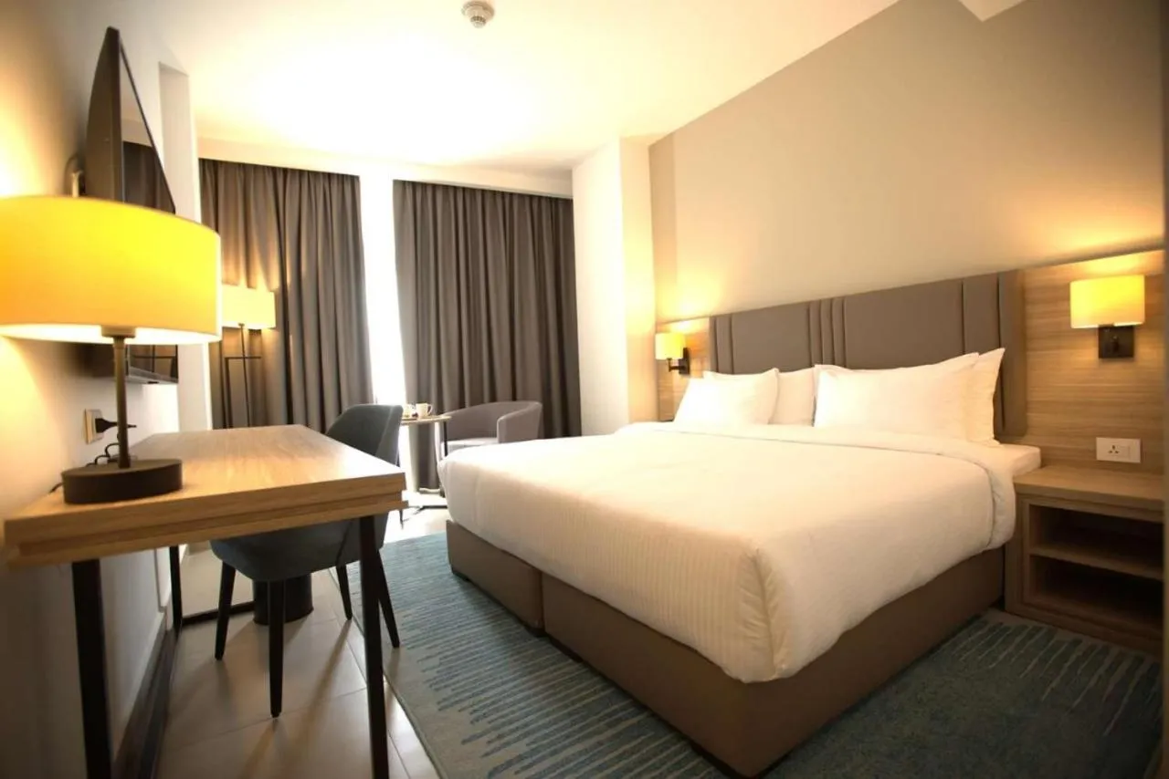 Bed in Golden Tulip Amman