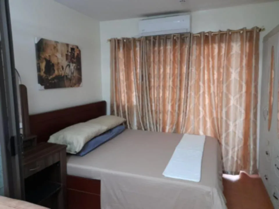 Bed in One Oasis Condo 1 bedroom