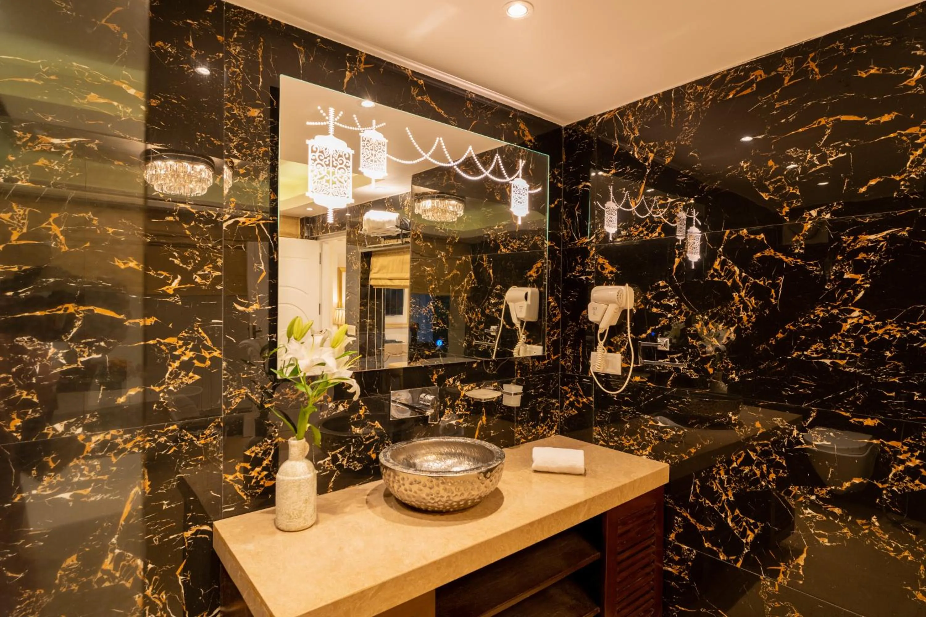 Bathroom in Emperor Ozran by Alaya Stays