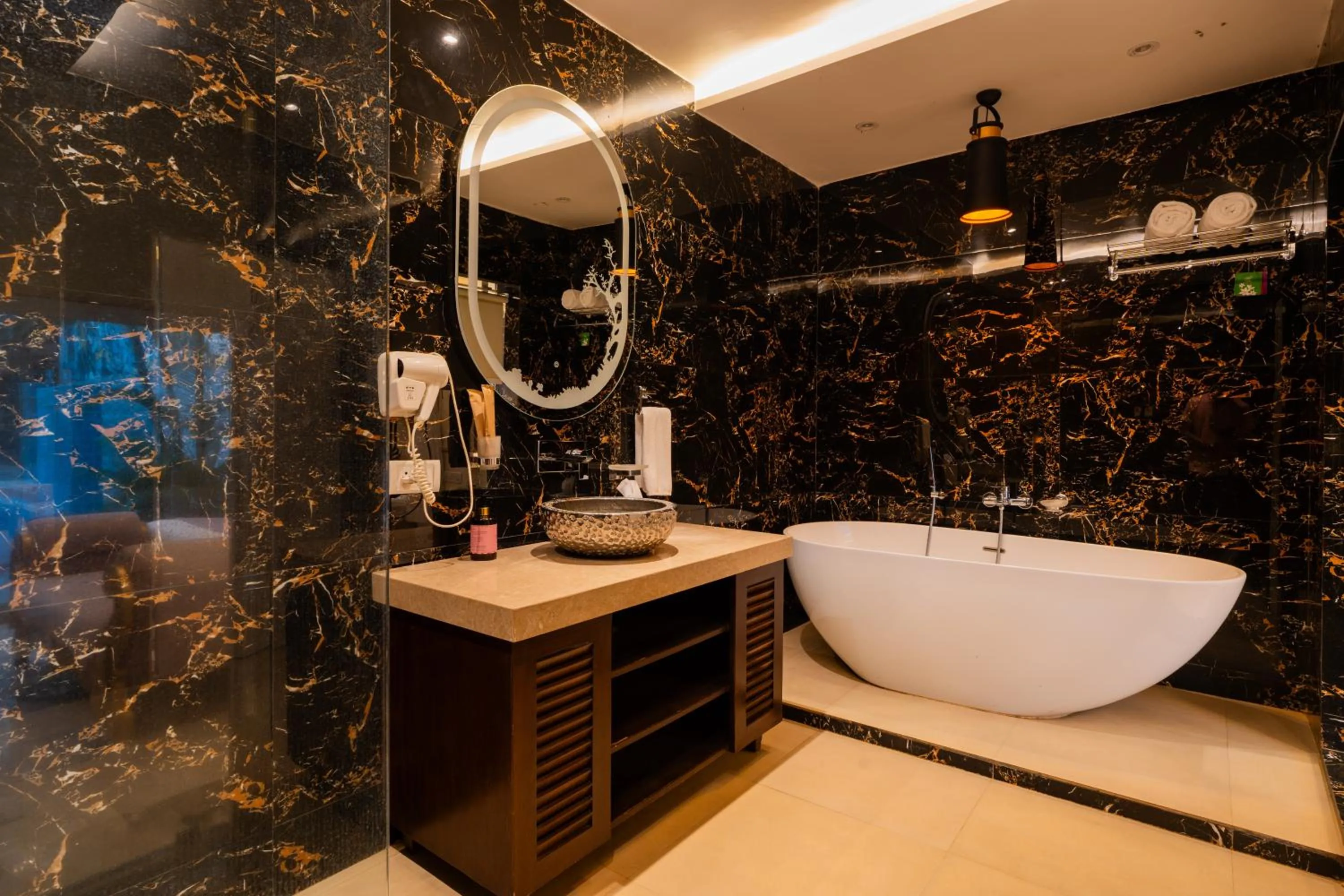 Bathroom in Emperor Ozran by Alaya Stays