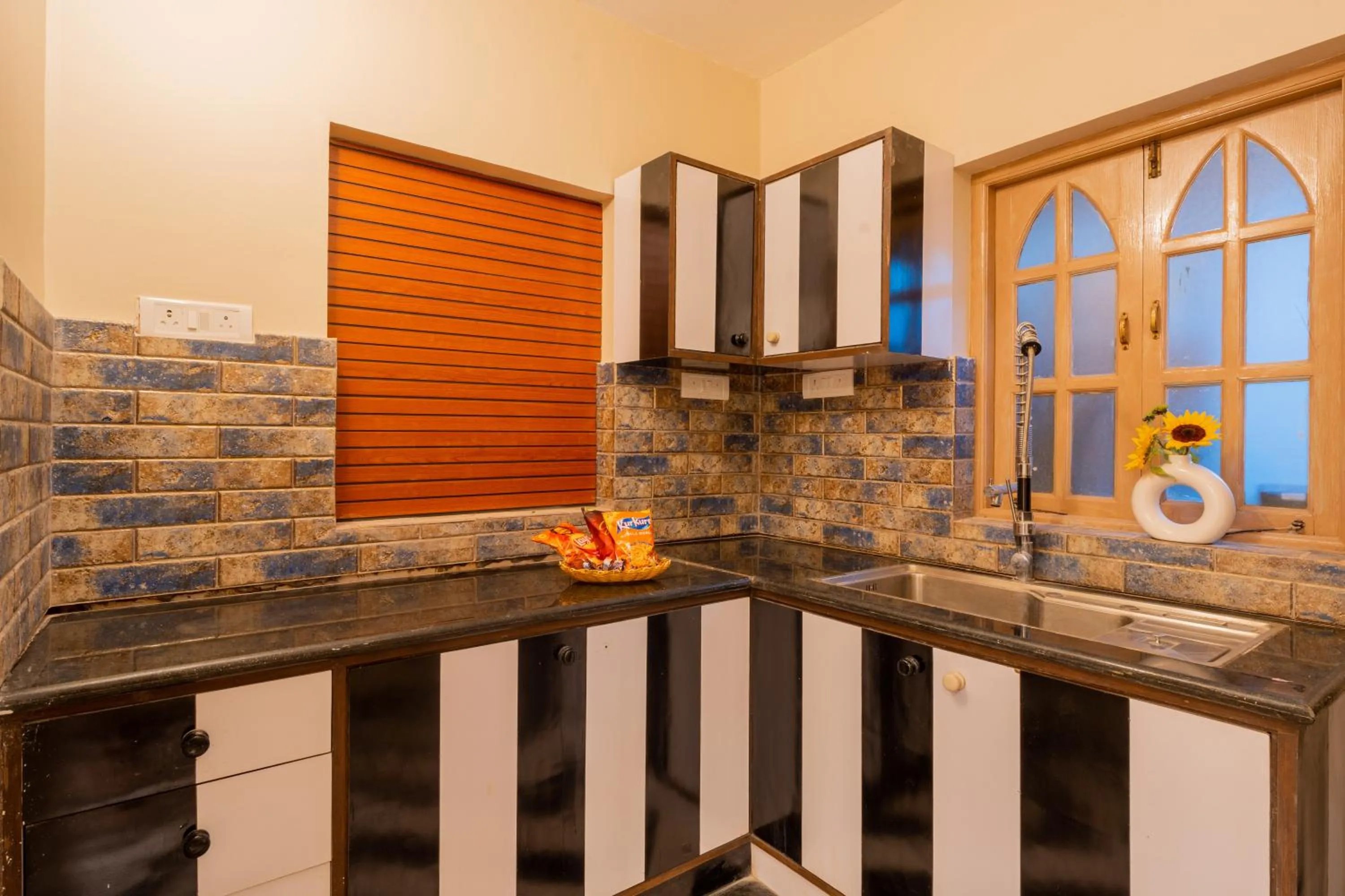 Kitchen or kitchenette in Emperor Ozran by Alaya Stays