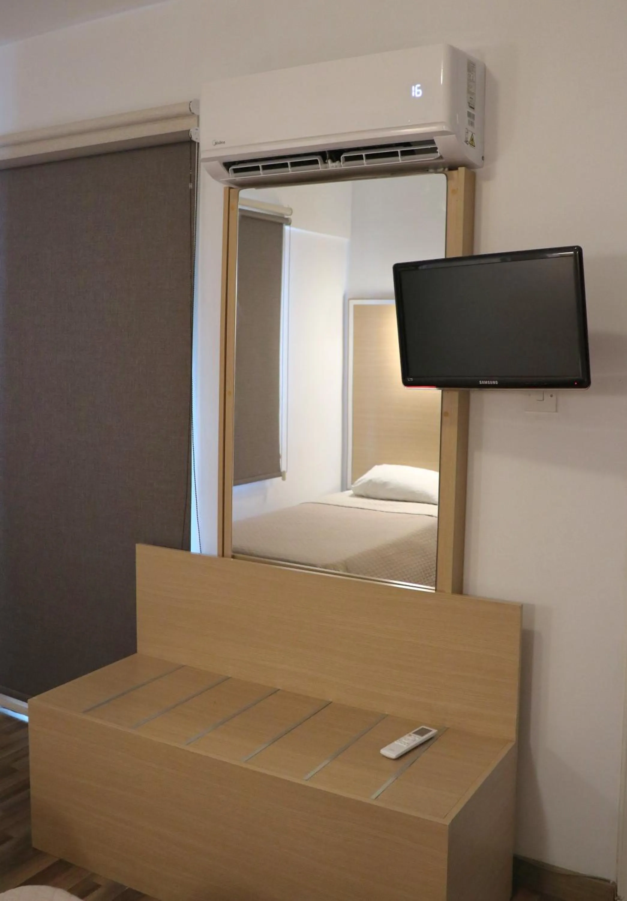 Bed in Layiotis Hotel