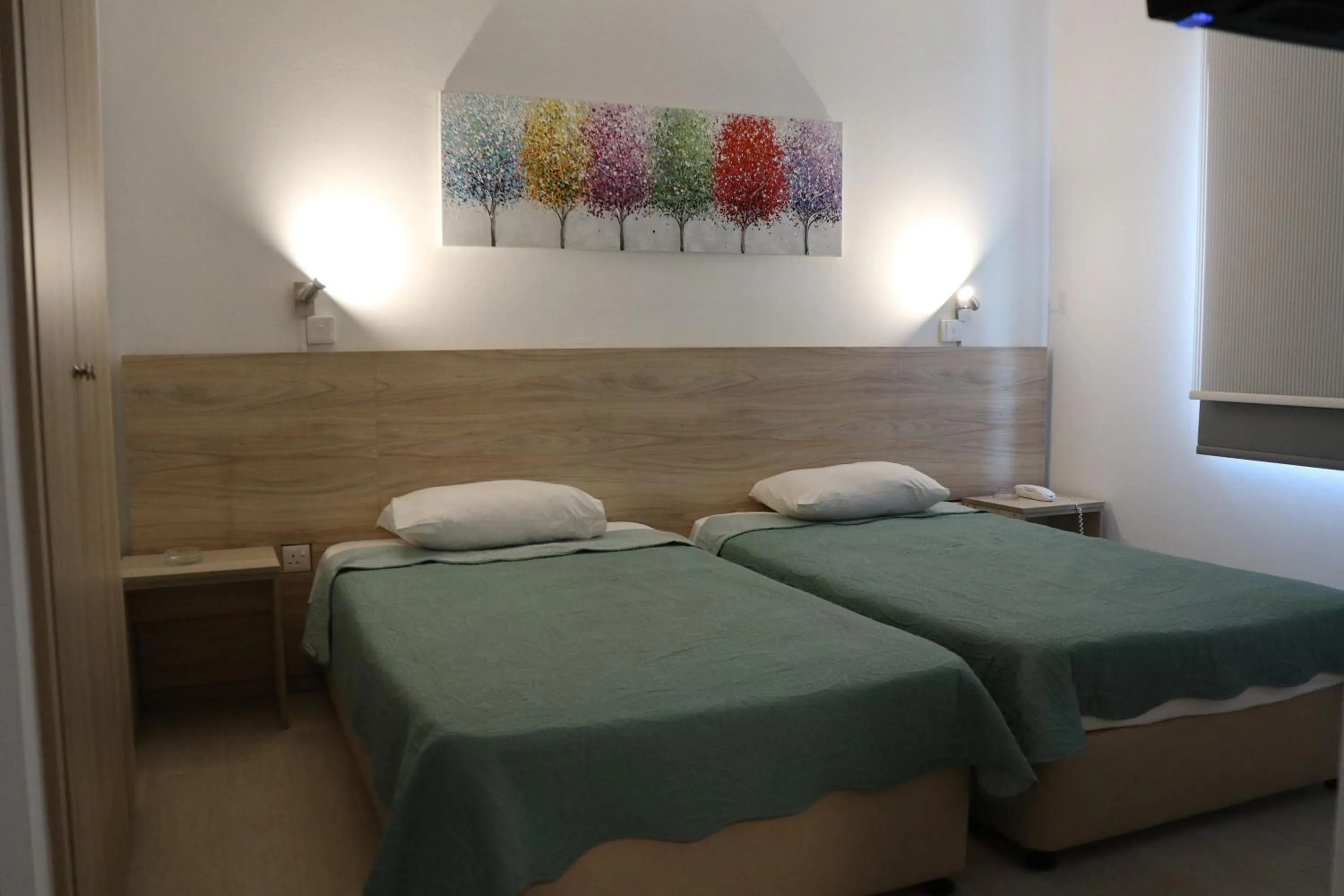 Bed in Layiotis Hotel