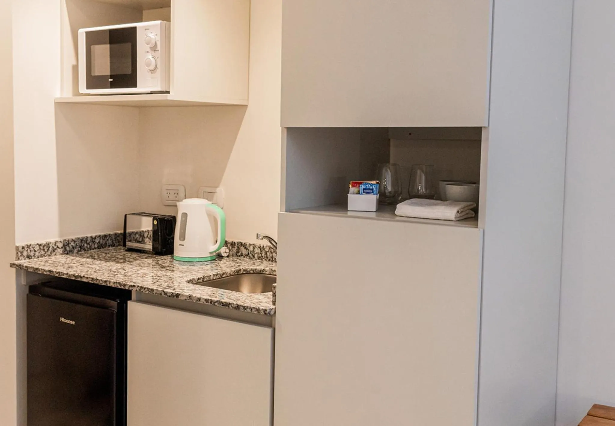 Kitchen or kitchenette in RentUp Suites Salta