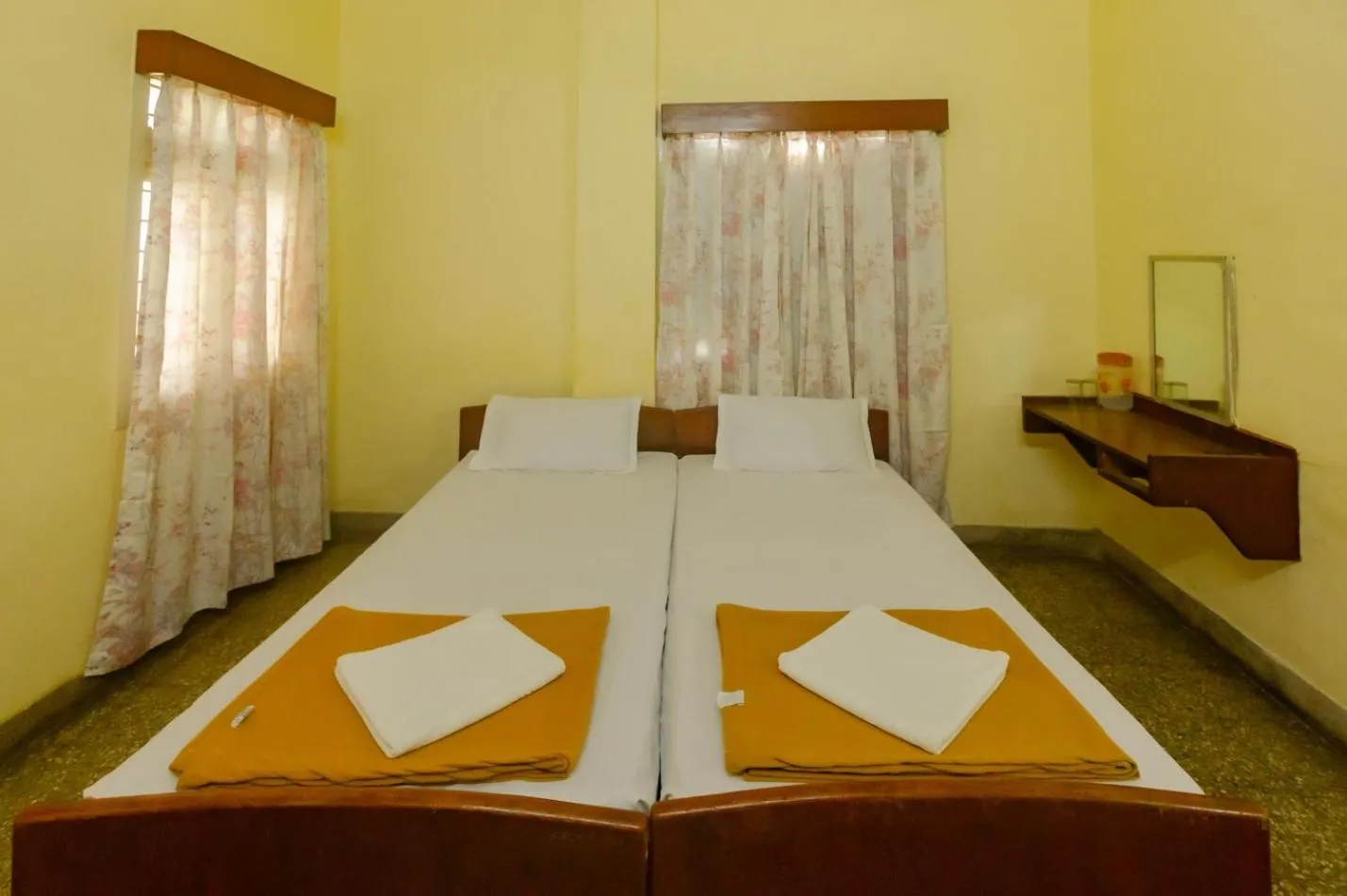 Bed in Sri Ramakrishna Hotel