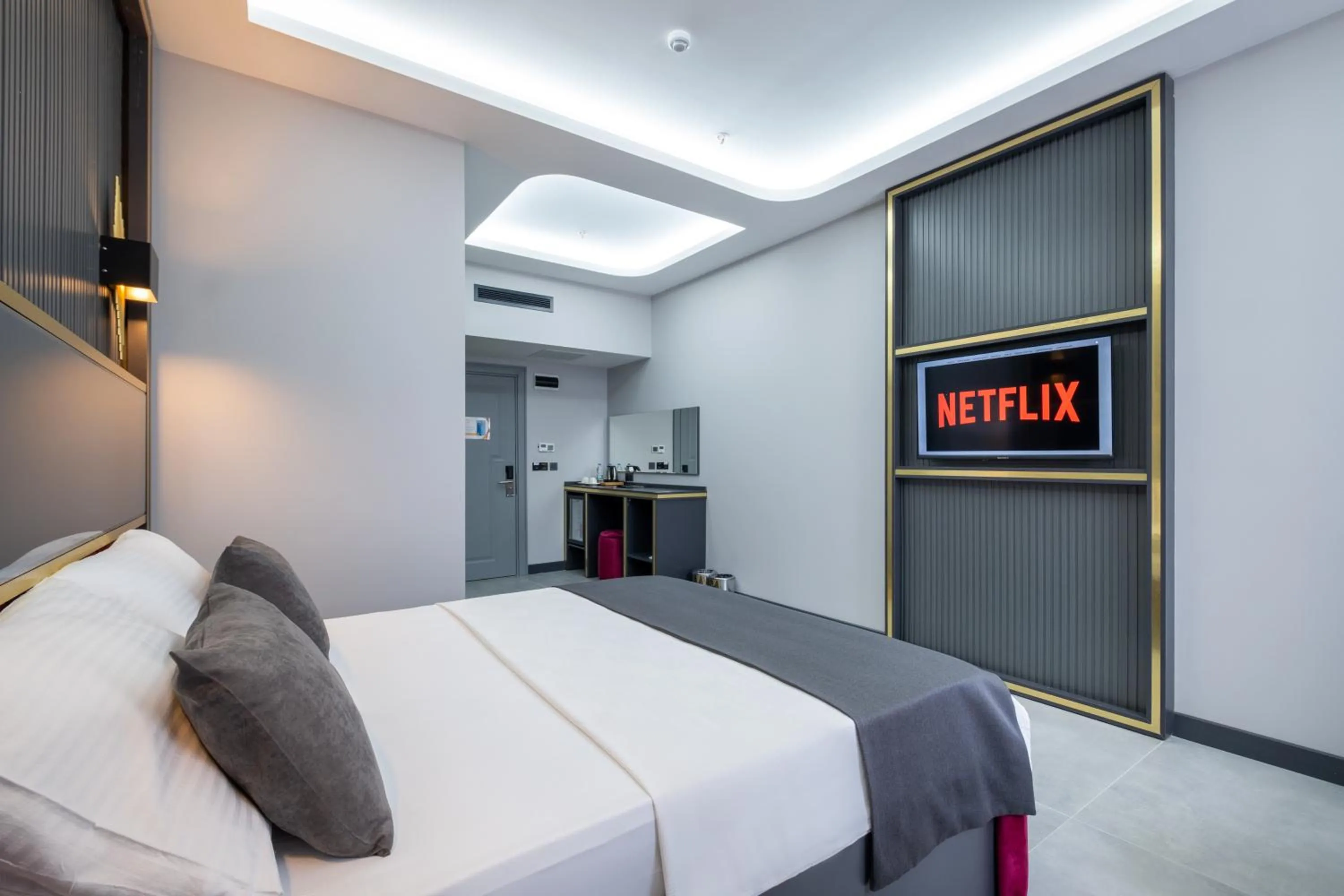 Bed in 216 Prestige Hotel