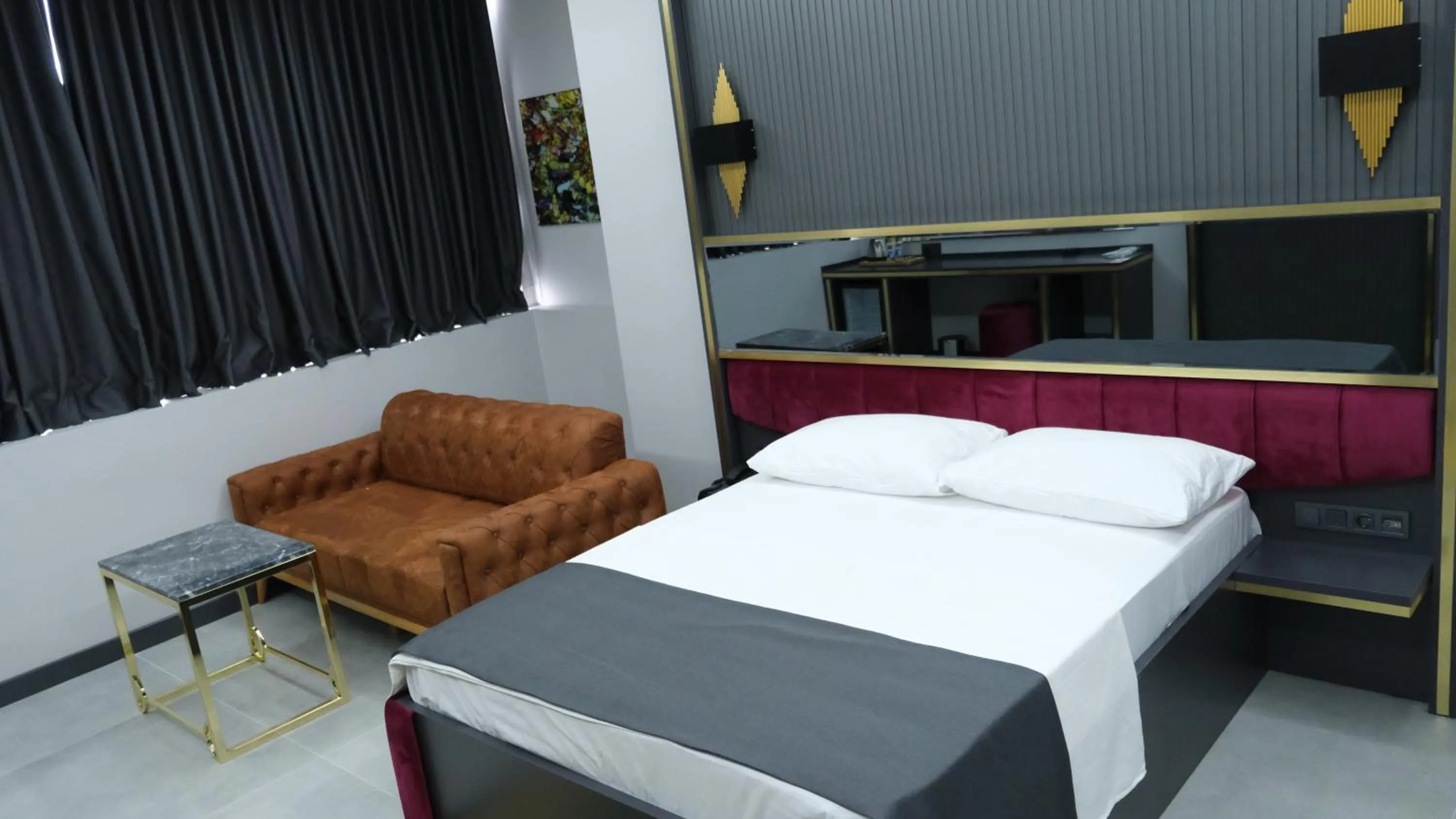 Bed in 216 Prestige Hotel