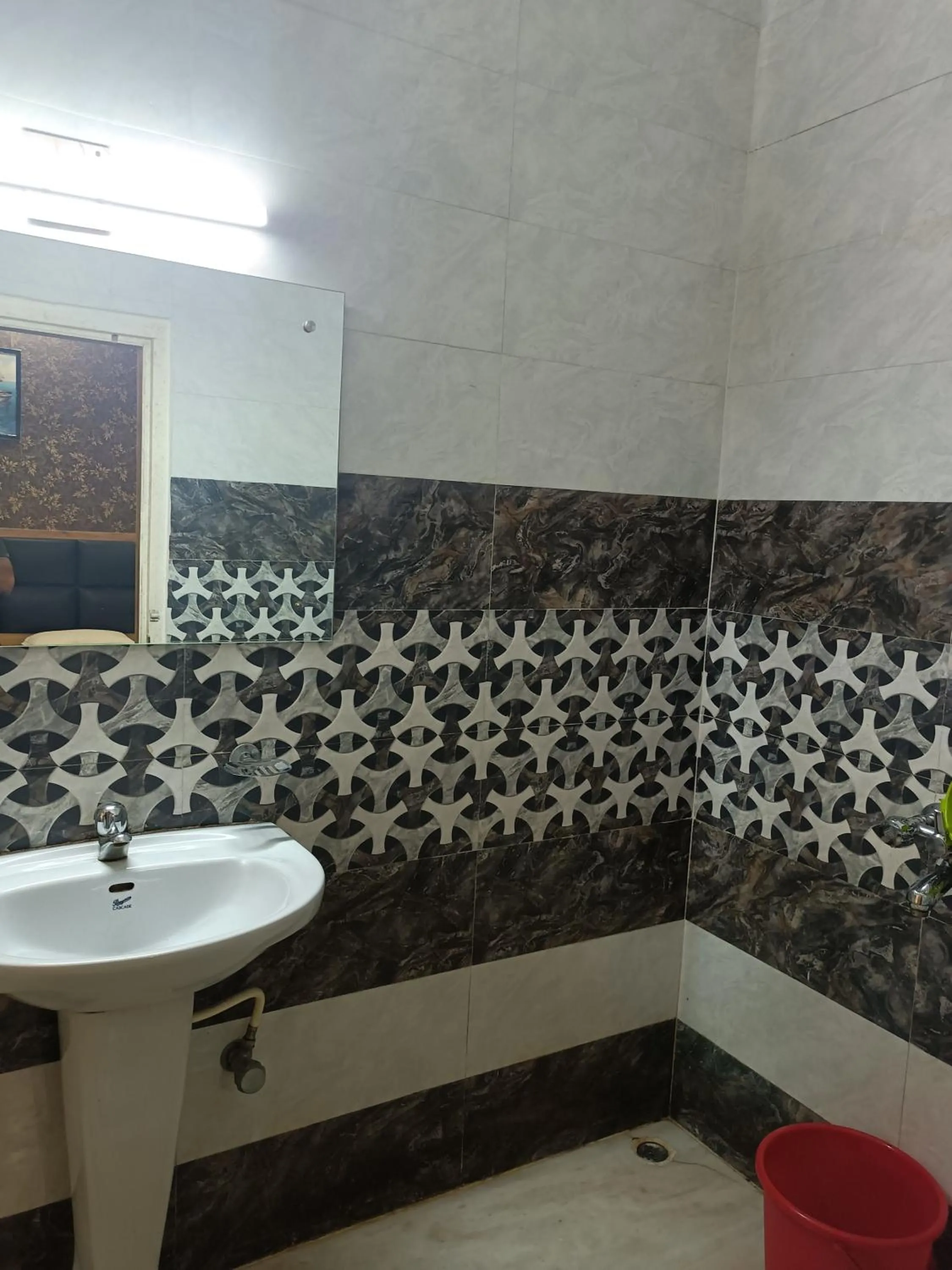Bathroom in HOTEL SUDAKSHINA by ROH