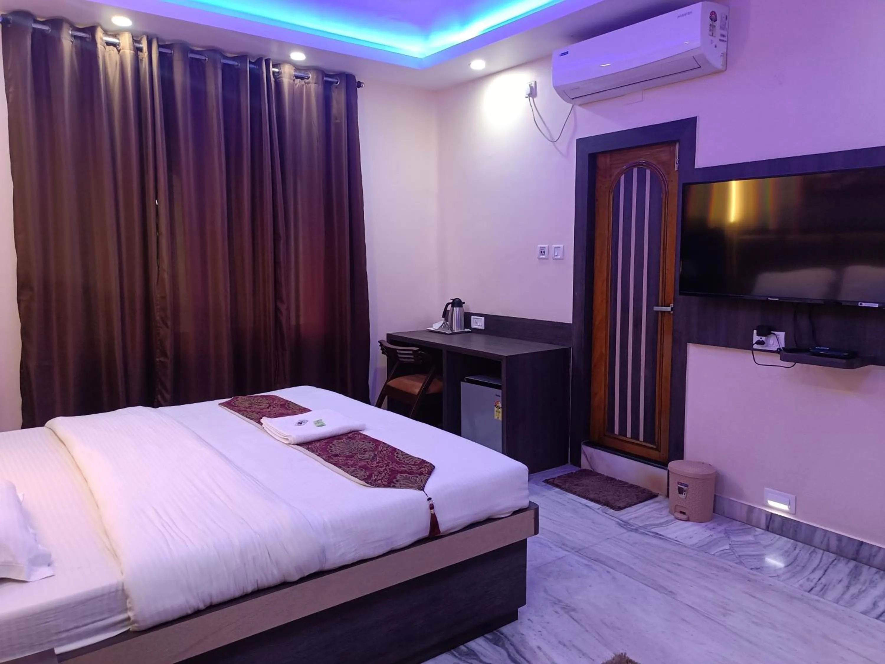 Bed in HOTEL SUDAKSHINA by ROH