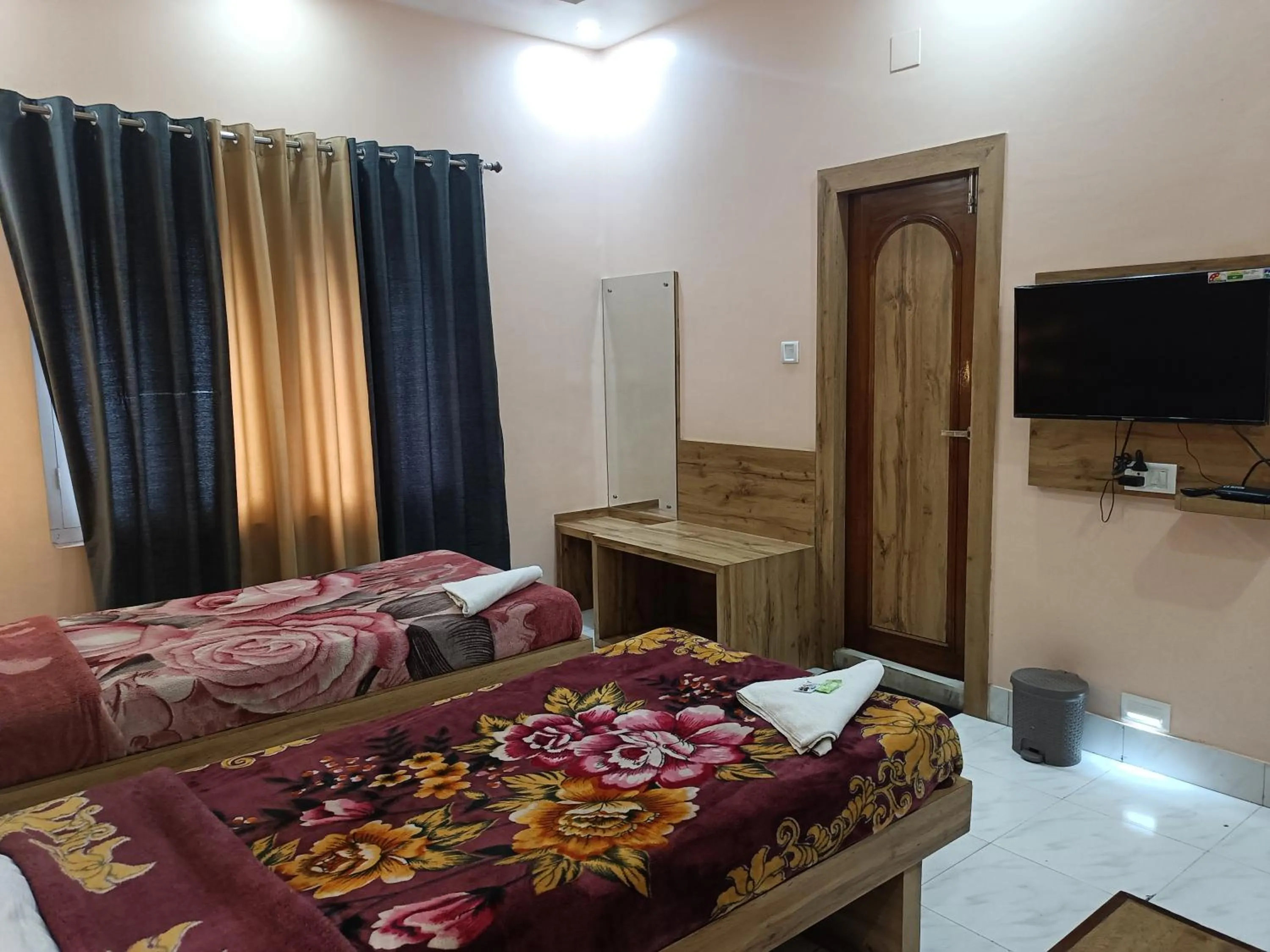 Bed in HOTEL SUDAKSHINA by ROH