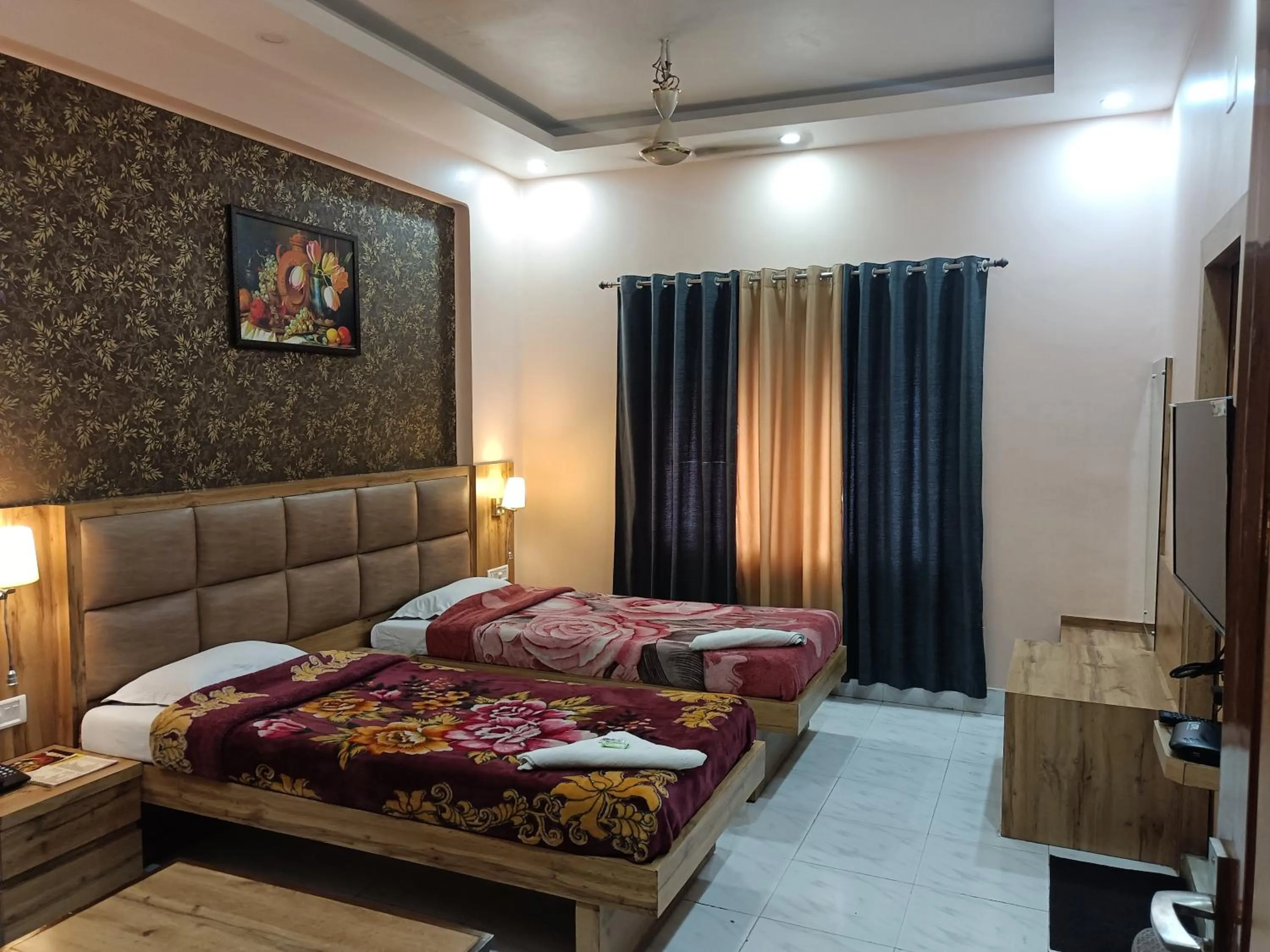 Bed in HOTEL SUDAKSHINA by ROH