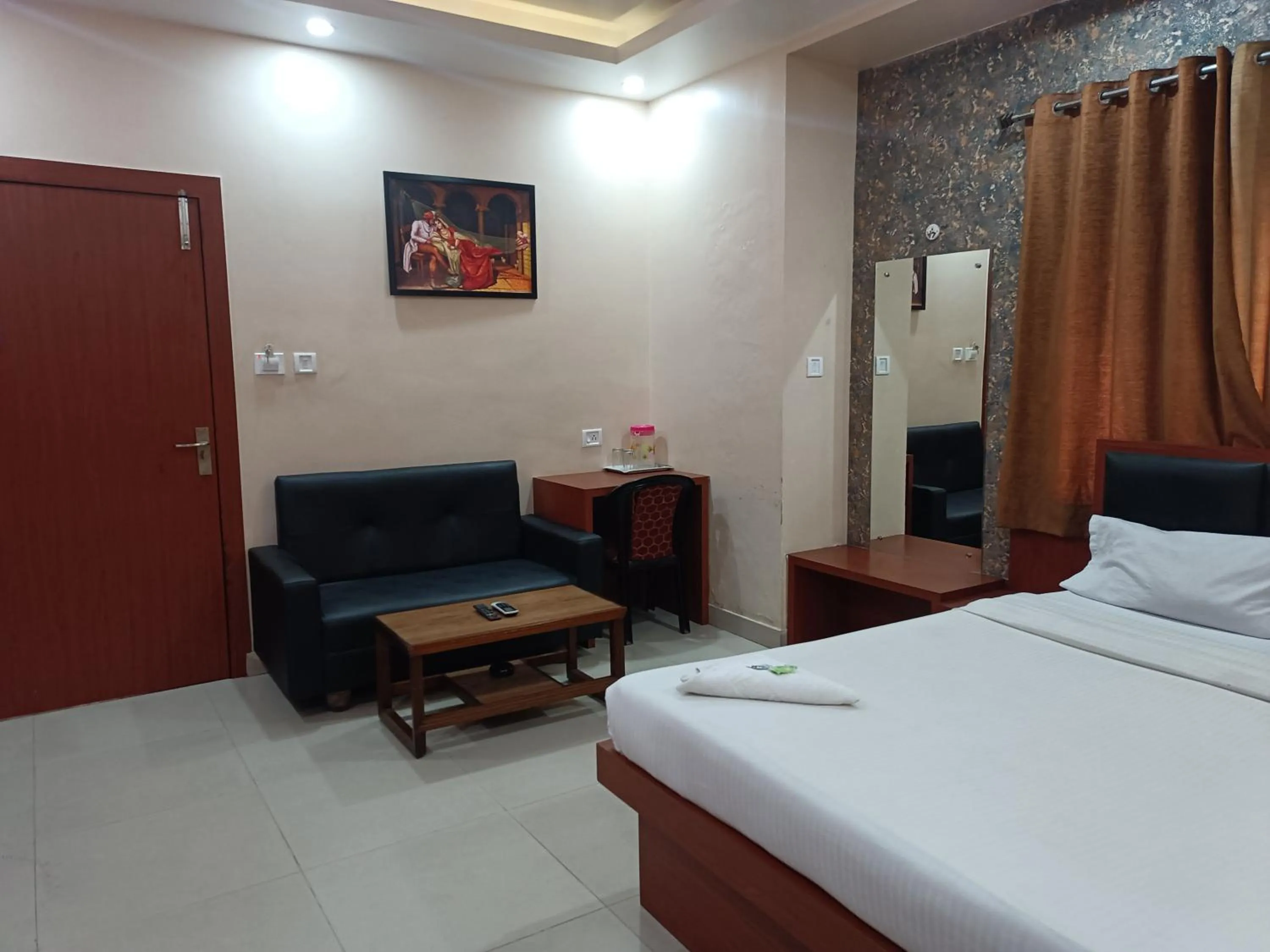 Bed in HOTEL SUDAKSHINA by ROH