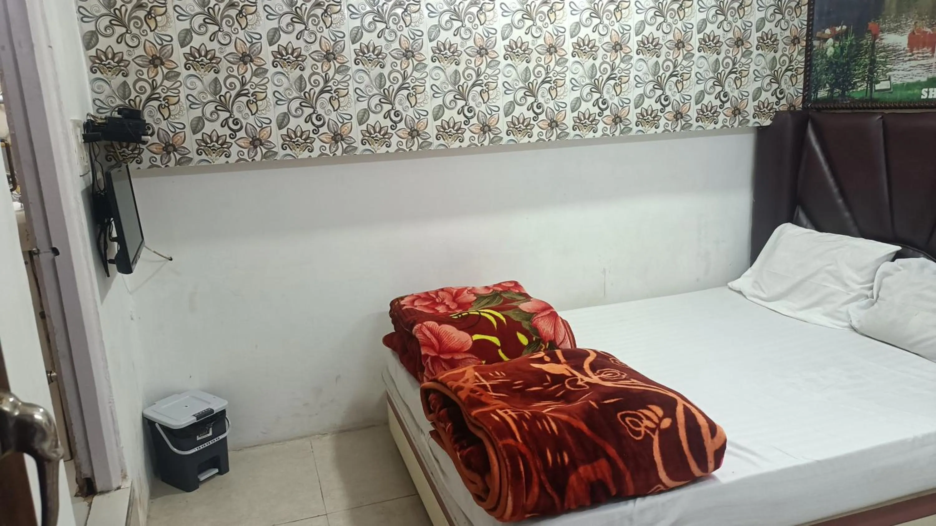 Bed in HOTEL SUDAKSHINA by ROH