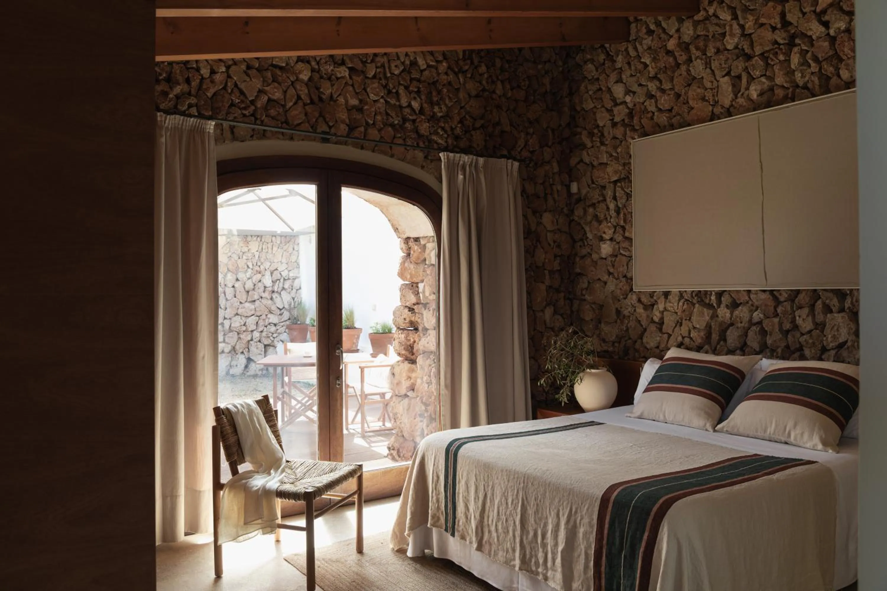 Bed in Binissaida Boutique Hotel