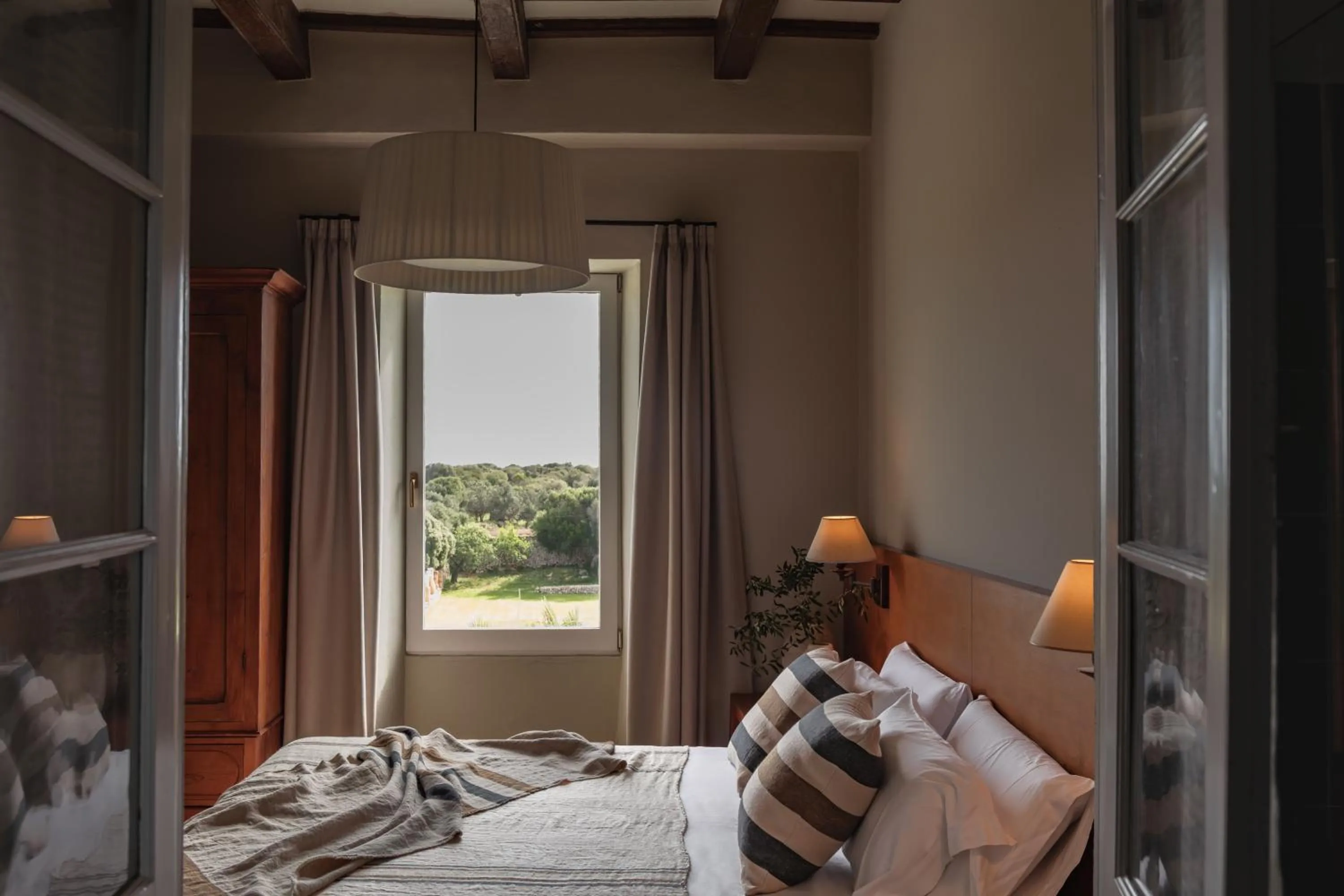 Bed in Binissaida Boutique Hotel