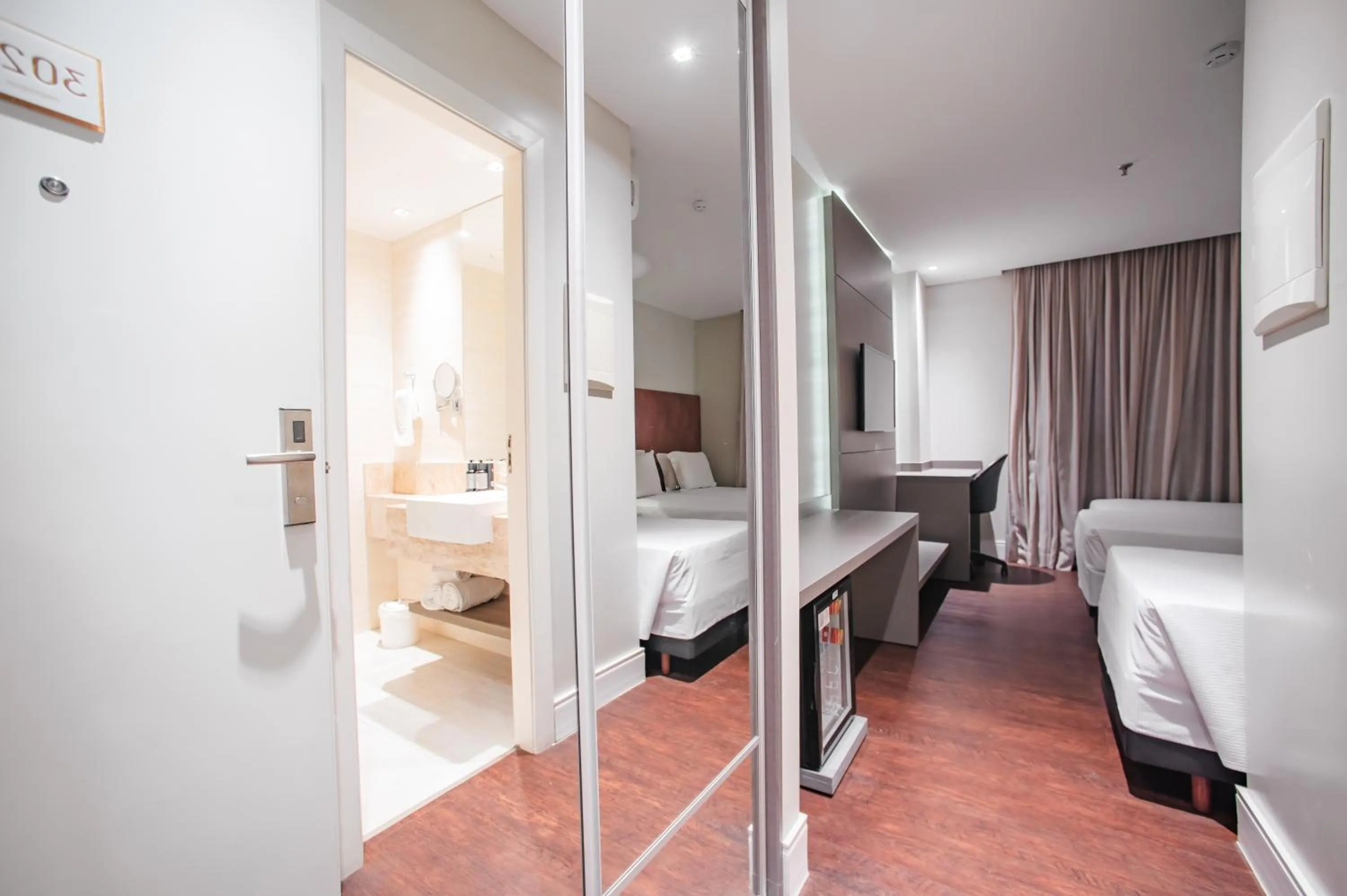 Bed in Brut by Slaviero Hotéis