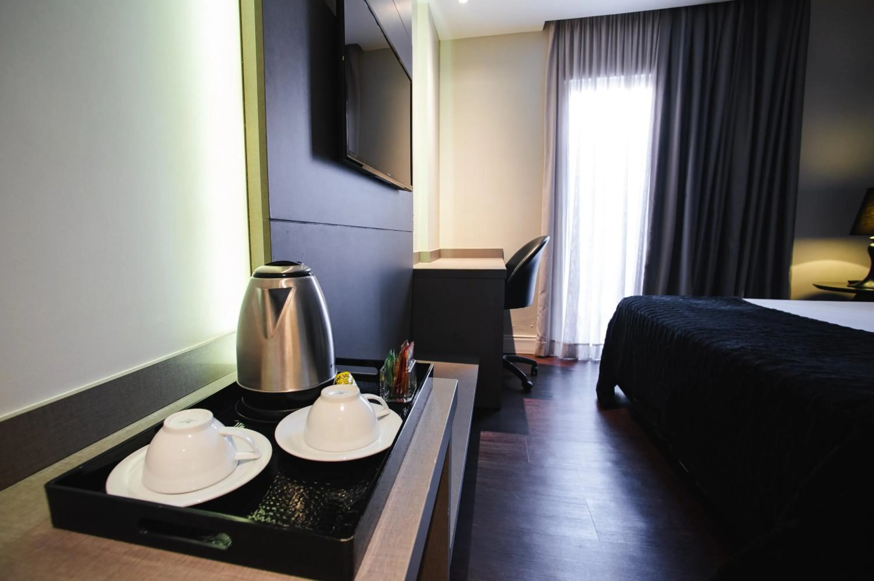 Bed in Brut by Slaviero Hotéis