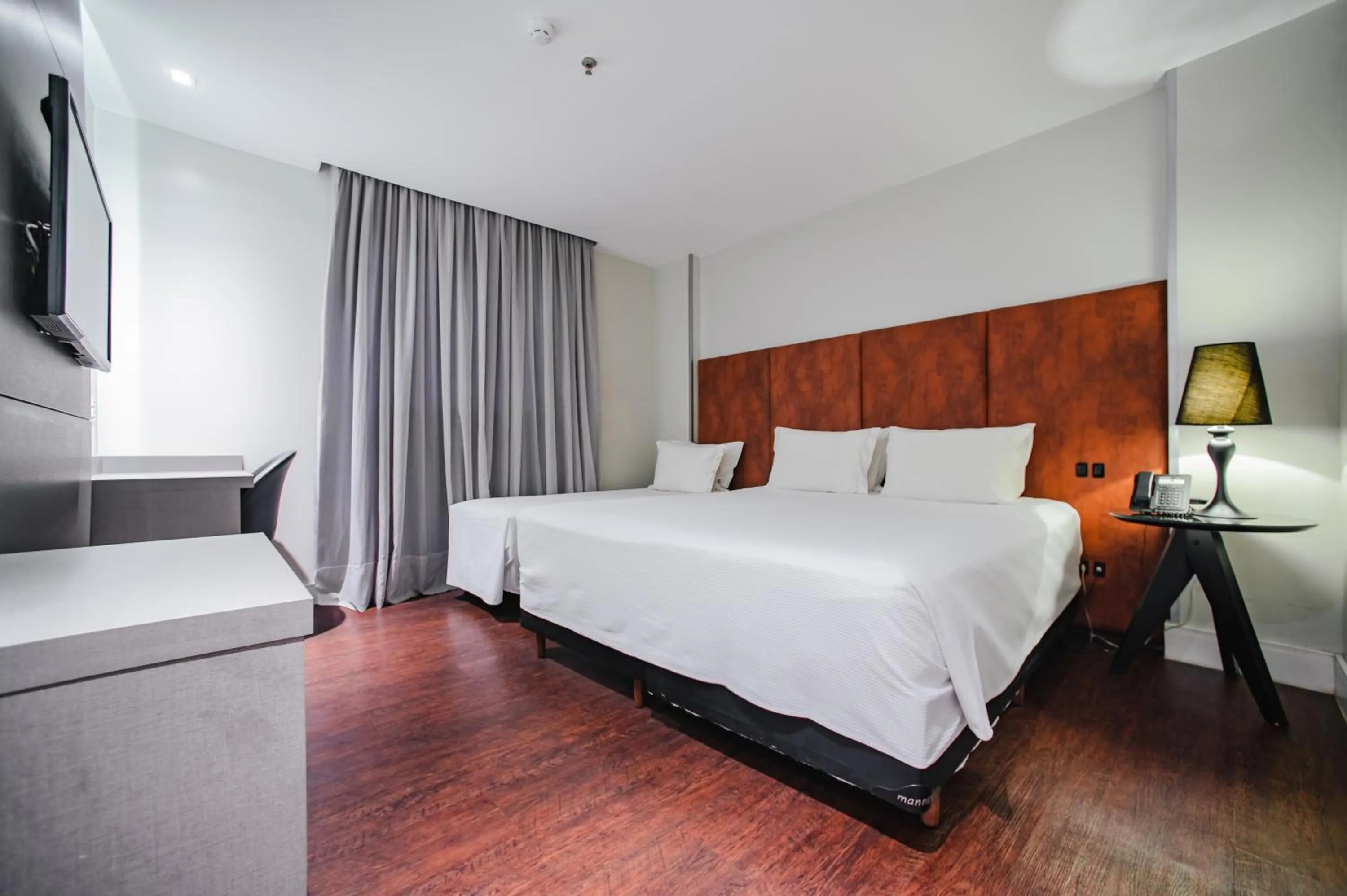 Bed in Brut by Slaviero Hotéis