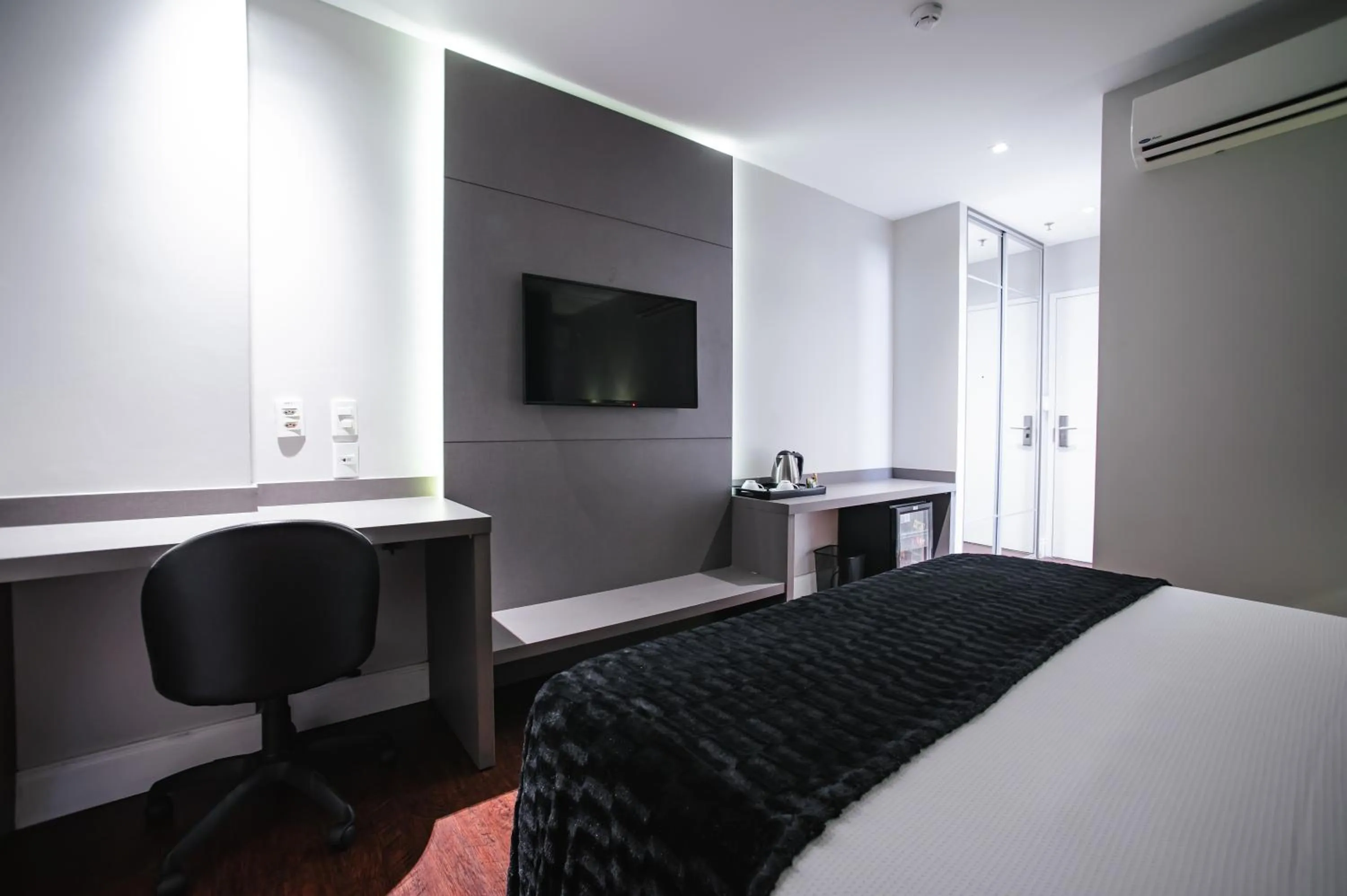 Bed in Brut by Slaviero Hotéis