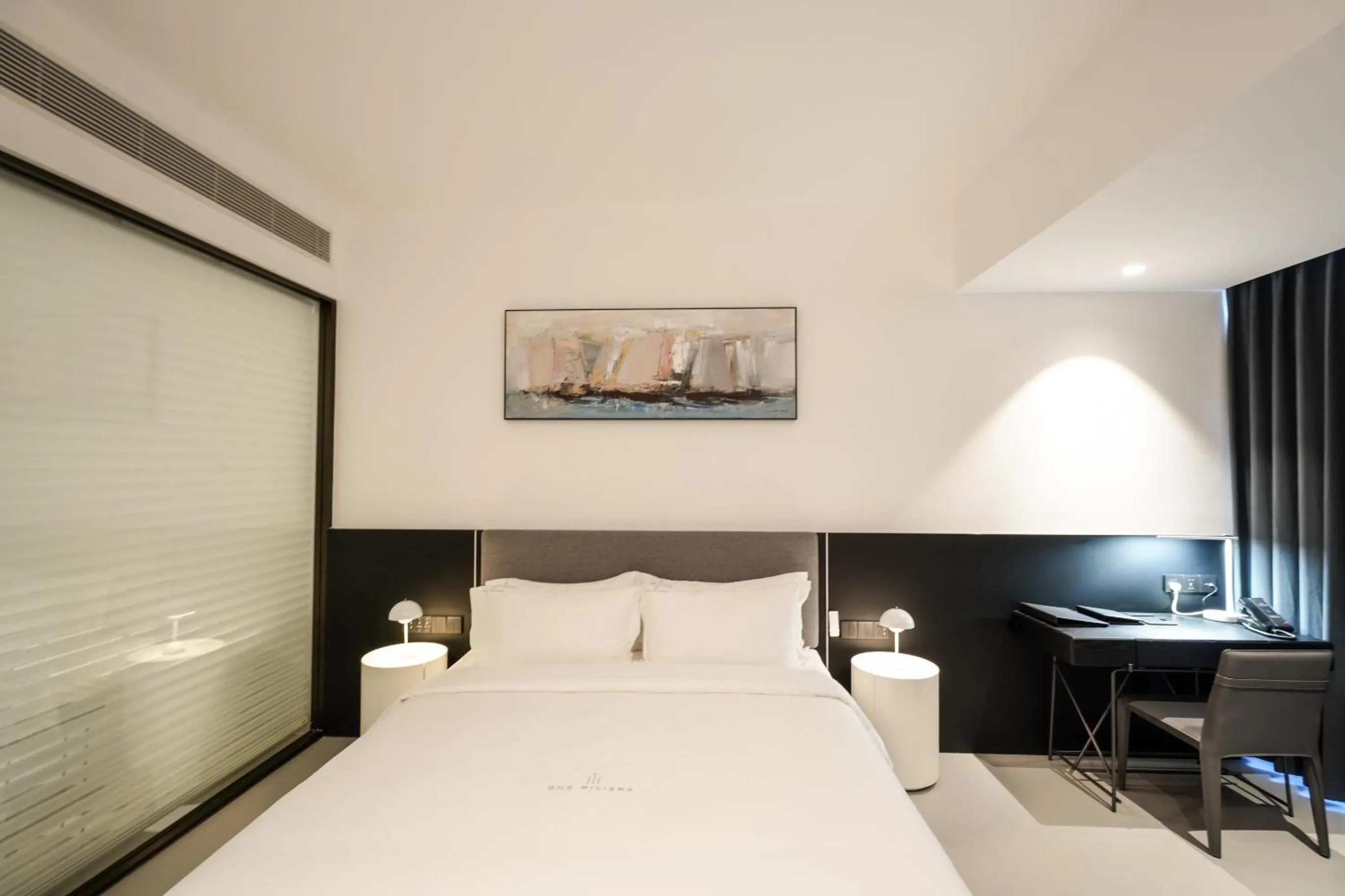 Bed in One Riviera Hotel and Residences