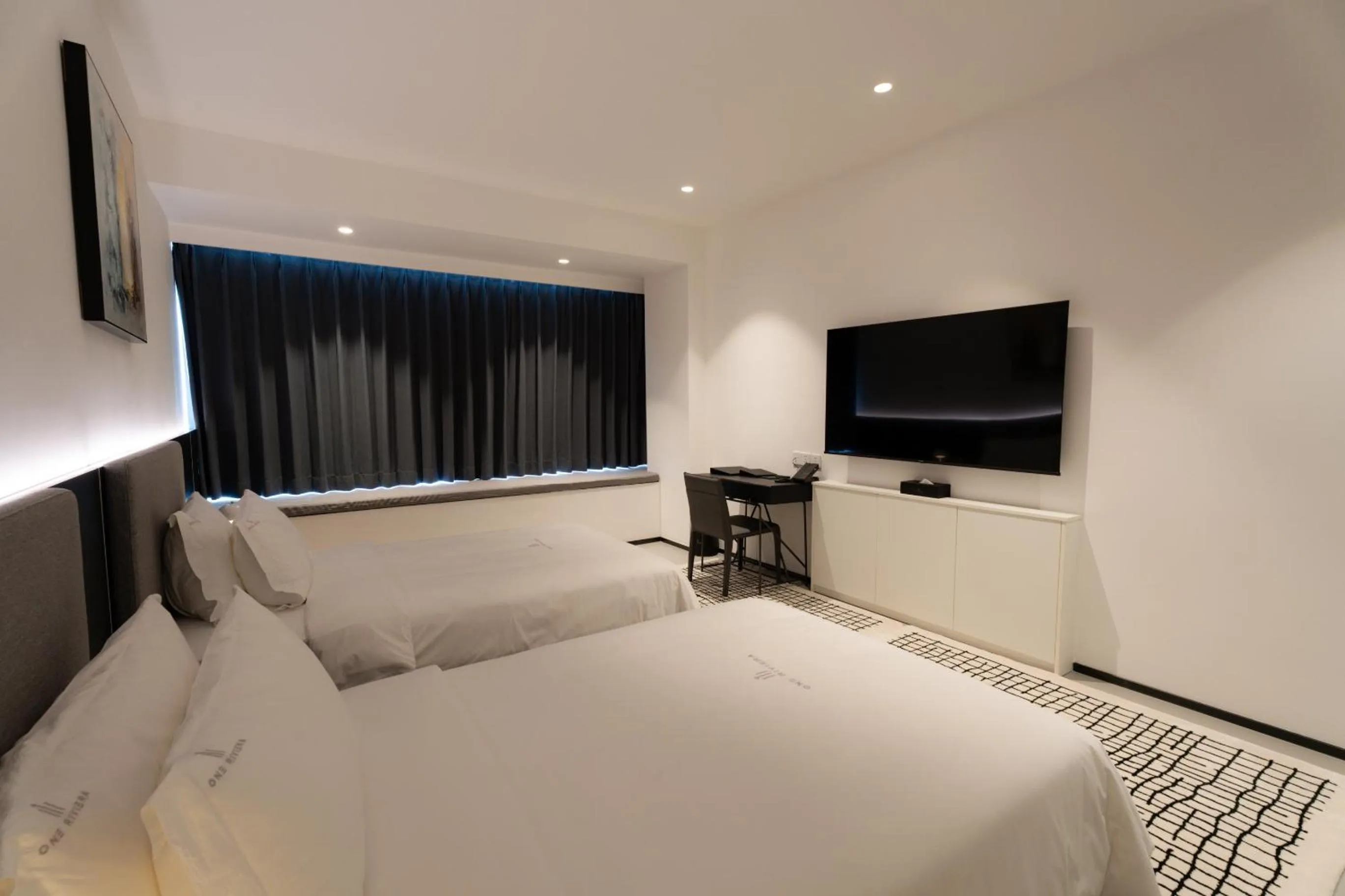 Bed in One Riviera Hotel and Residences