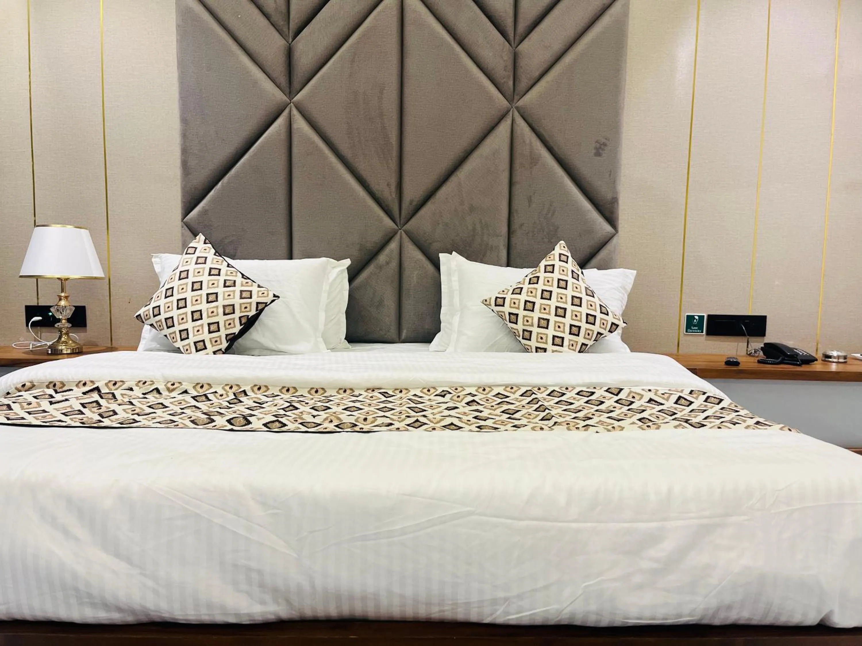 Bed in Hotel Royal Empire