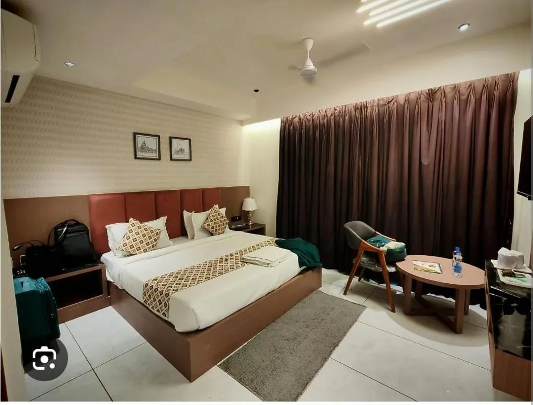 Bed in Hotel Royal Empire