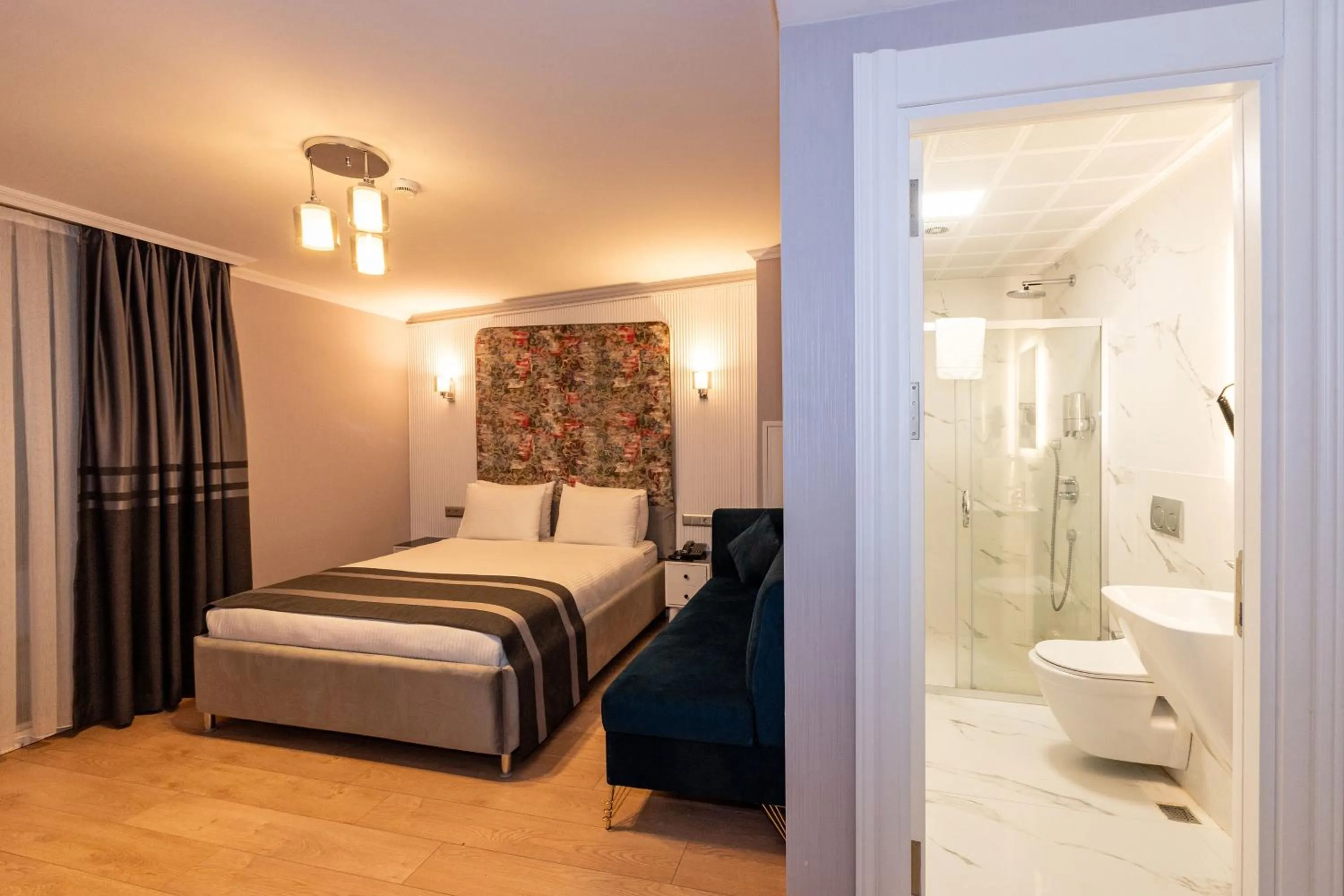 Toilet, Bed in The Now Hotel