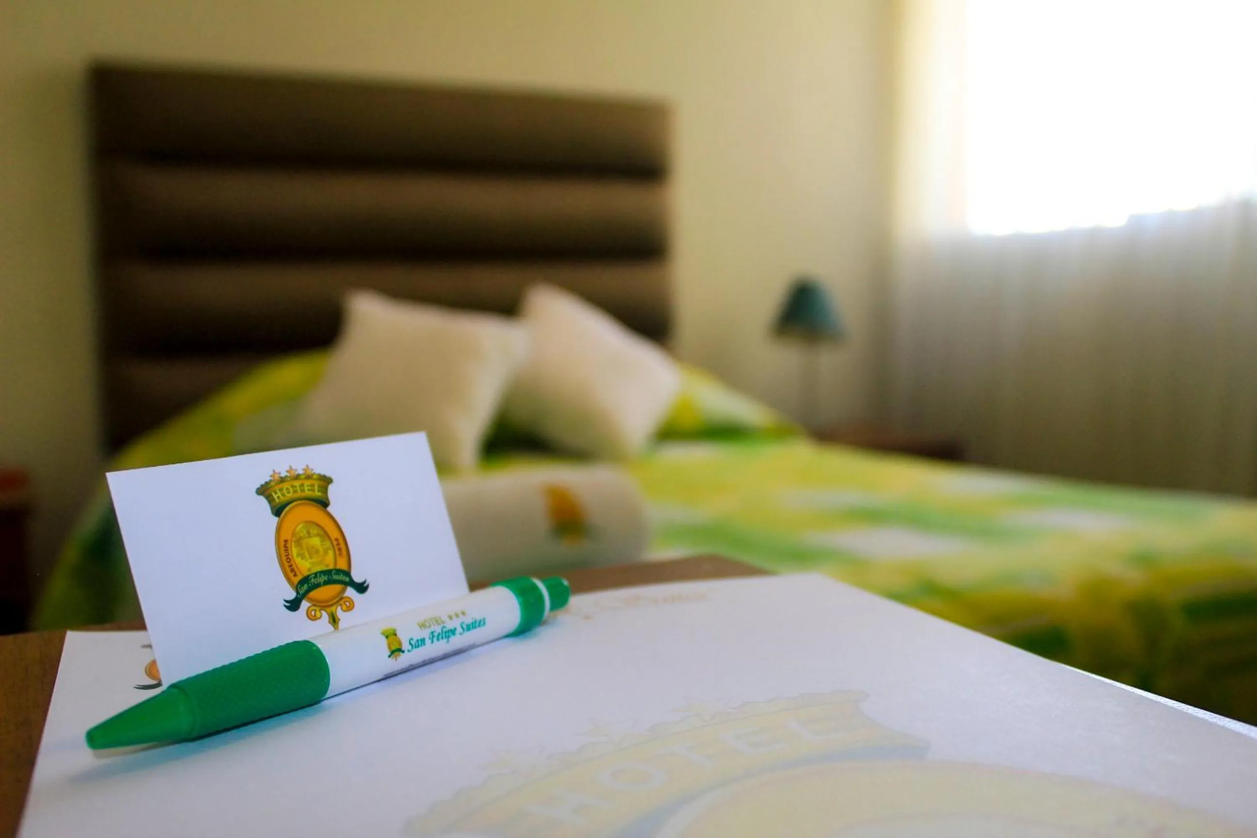 Bed in Hotel San Felipe Suites