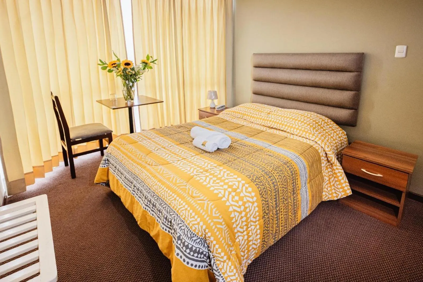 Bed in Hotel San Felipe Suites