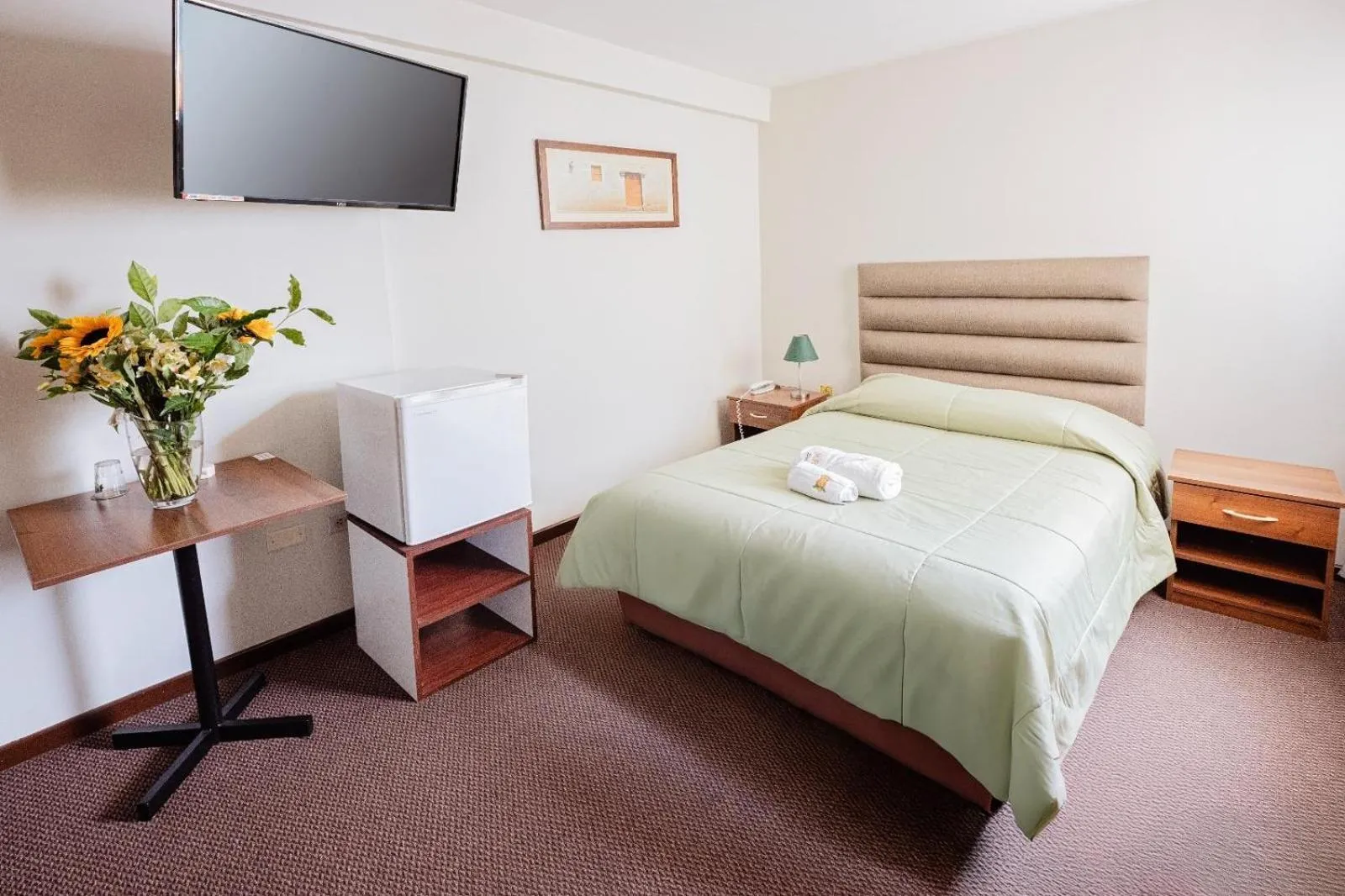 Bed in Hotel San Felipe Suites