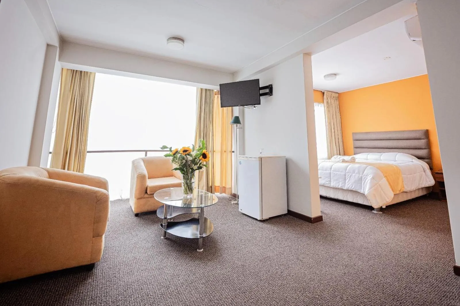 Bed in Hotel San Felipe Suites