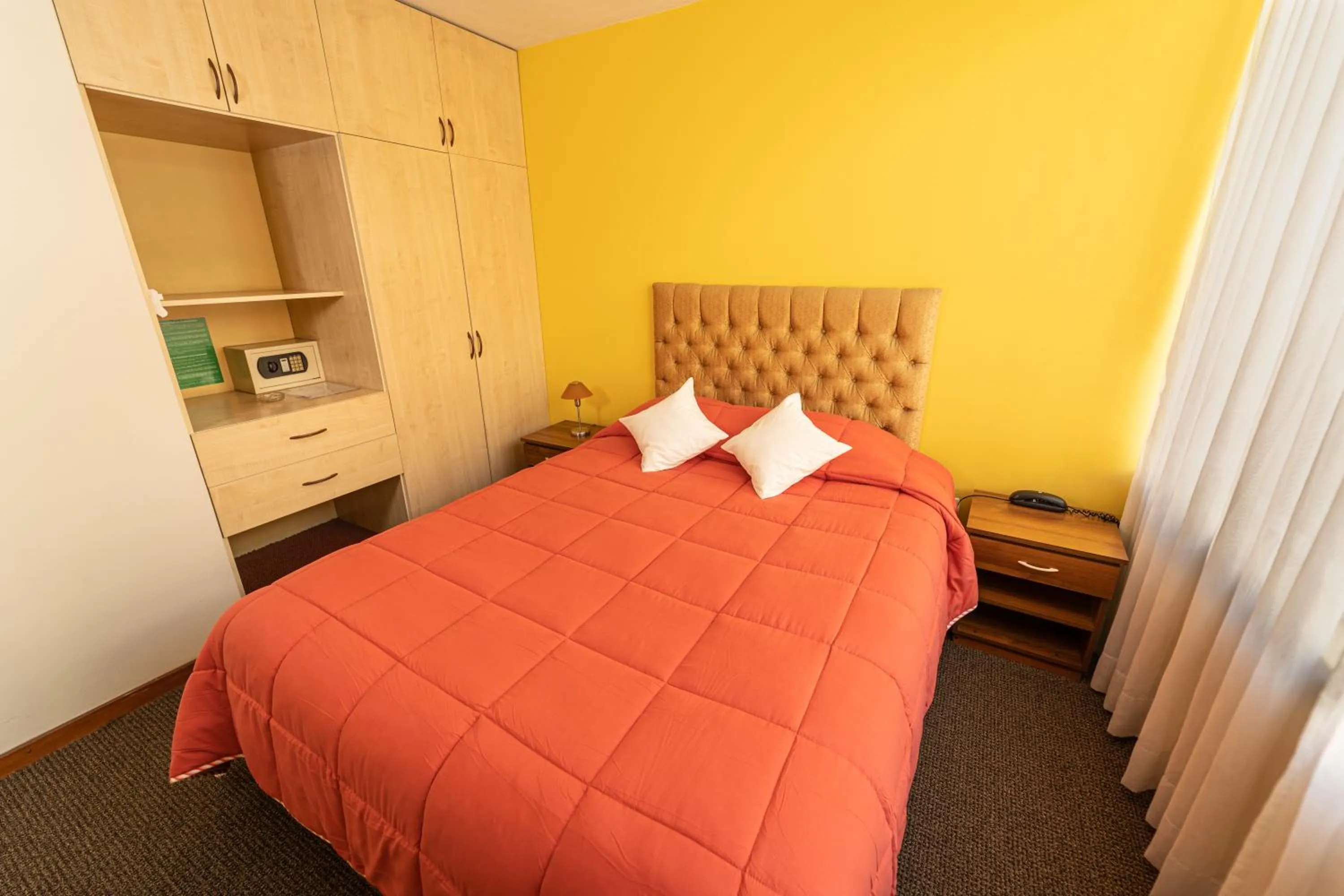 Bed in Hotel San Felipe Suites