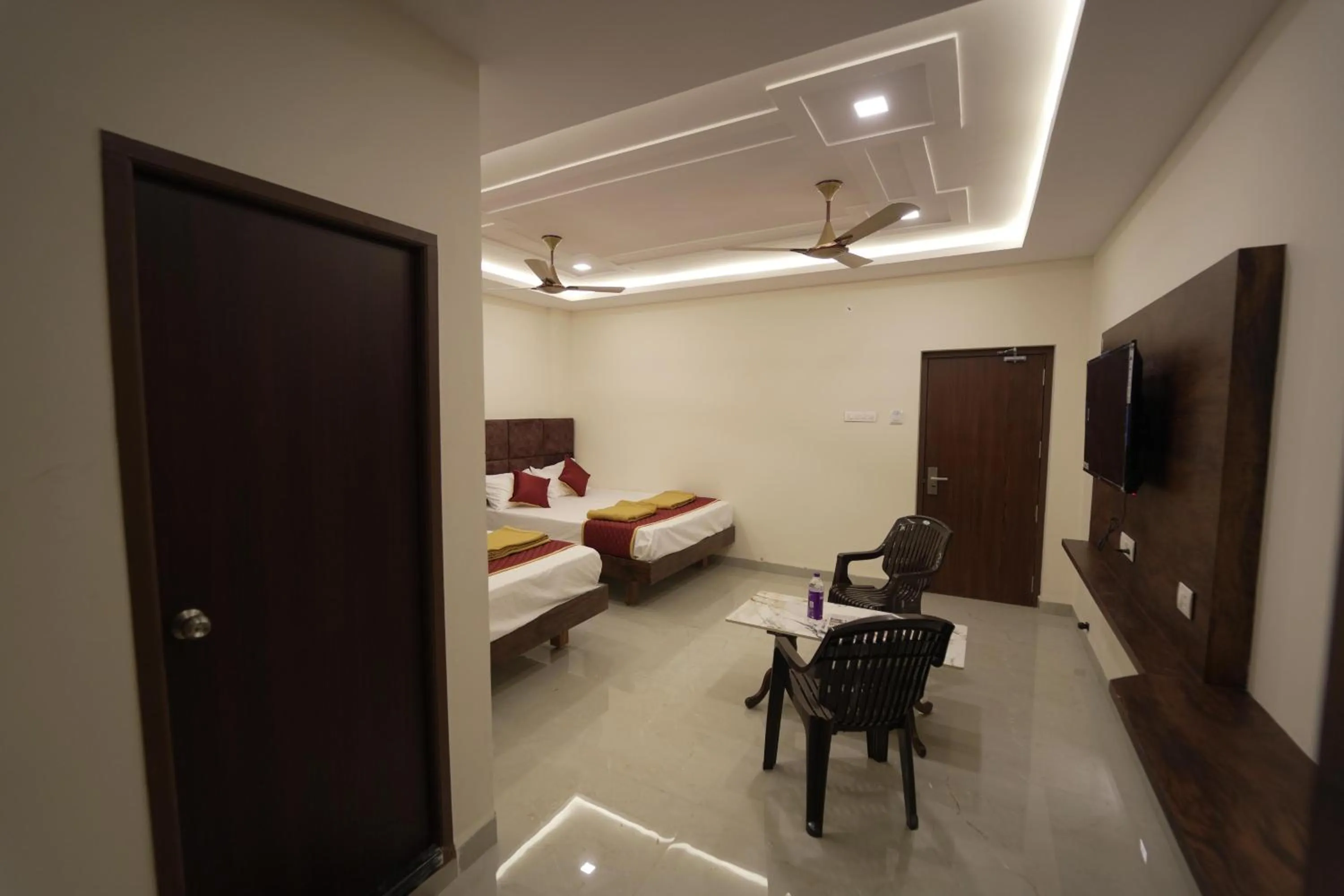 Living room, Bed in Arudra Residency