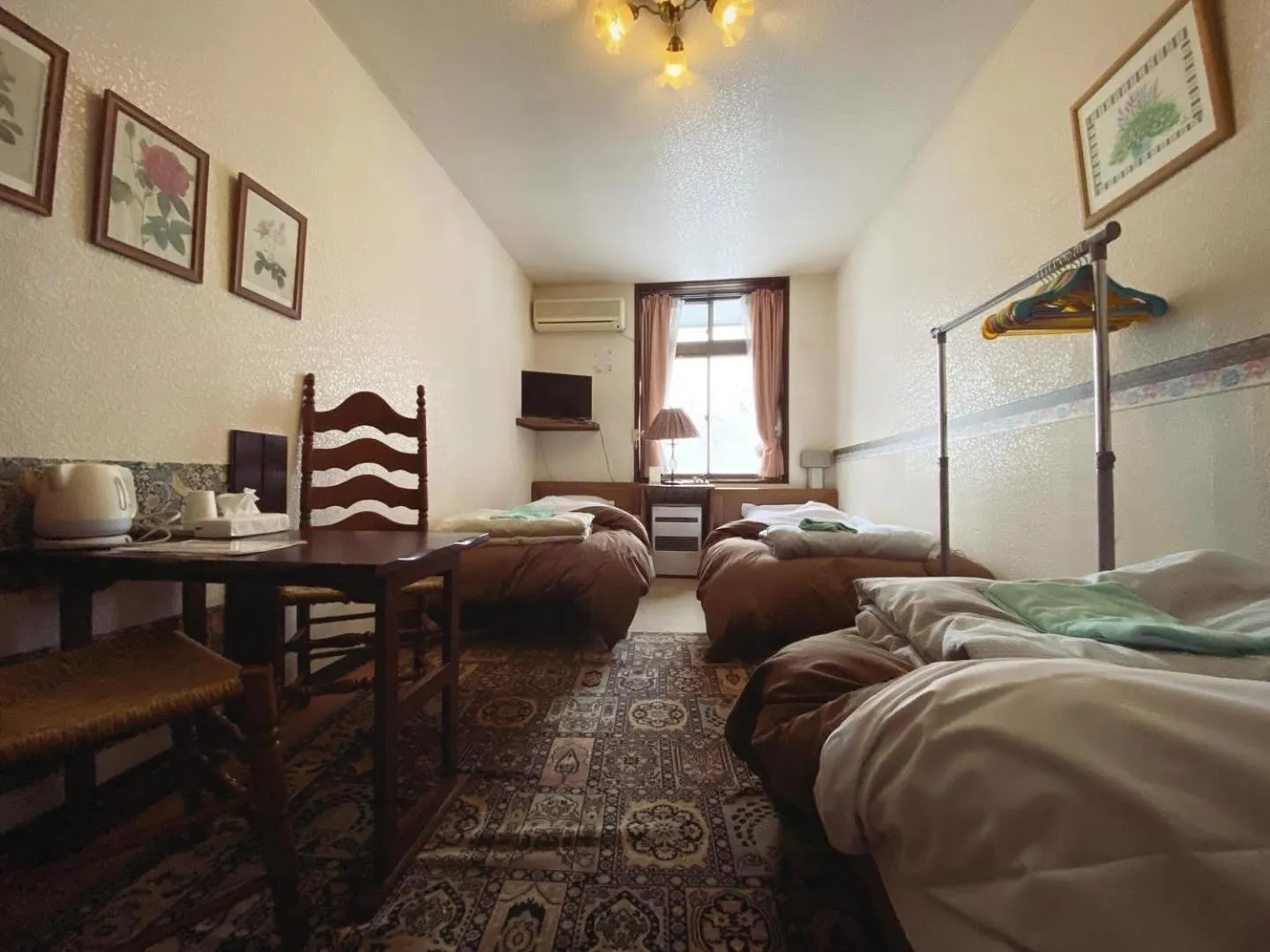 Photo of the whole room, Bed in Garden Pension Obergurgl