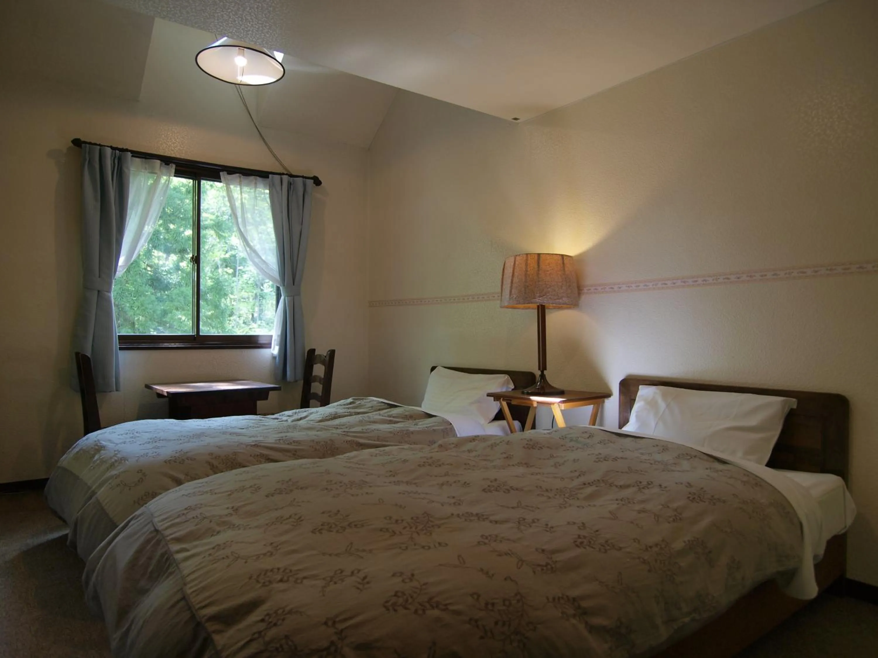 Photo of the whole room, Bed in Garden Pension Obergurgl